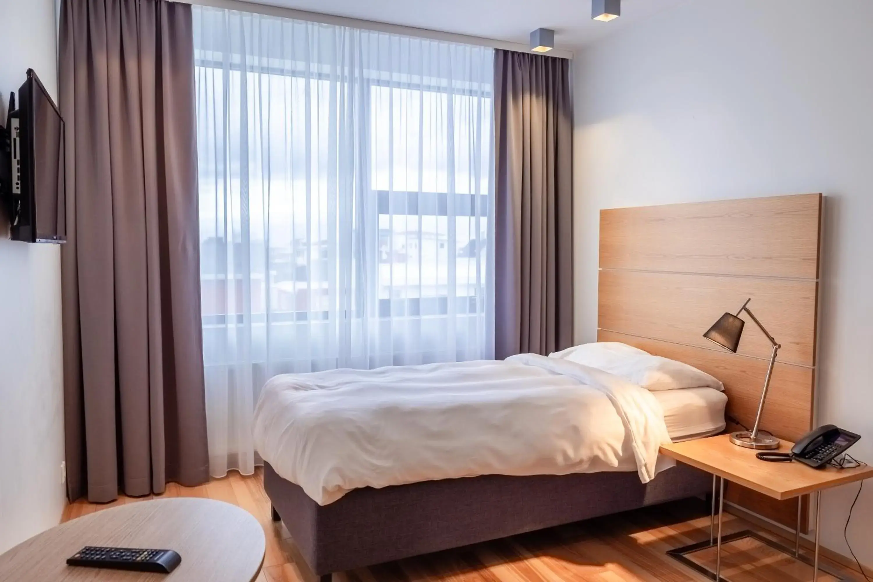 Photo of the whole room, Bed in Park Inn by Radisson Reykjavik Keflavík Airport Photo of the whole room, Bed in Park Inn by Radisson Reykjavik Keflavík Airport