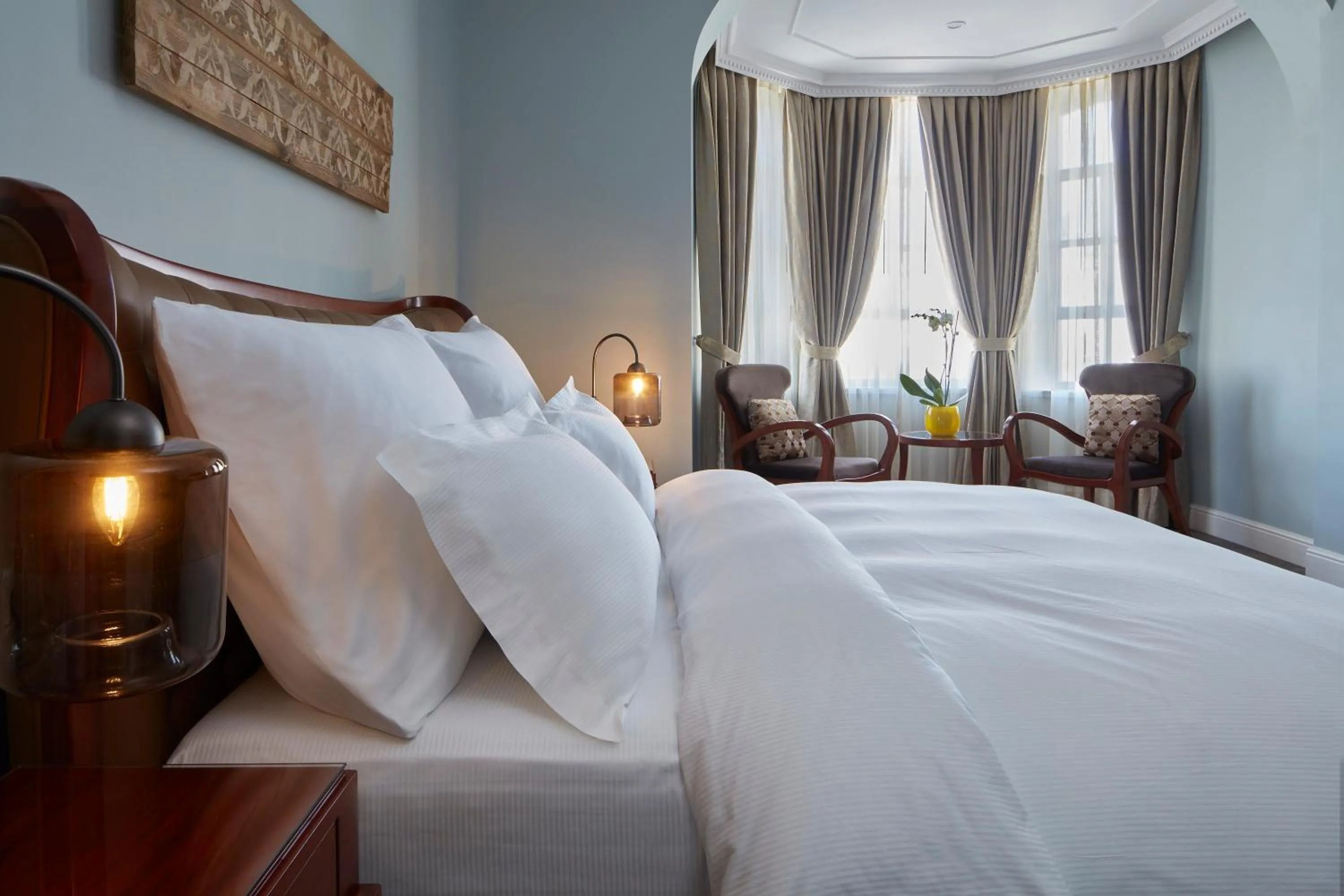 Photo of the whole room, Bed in Carmella Boutique Hotel