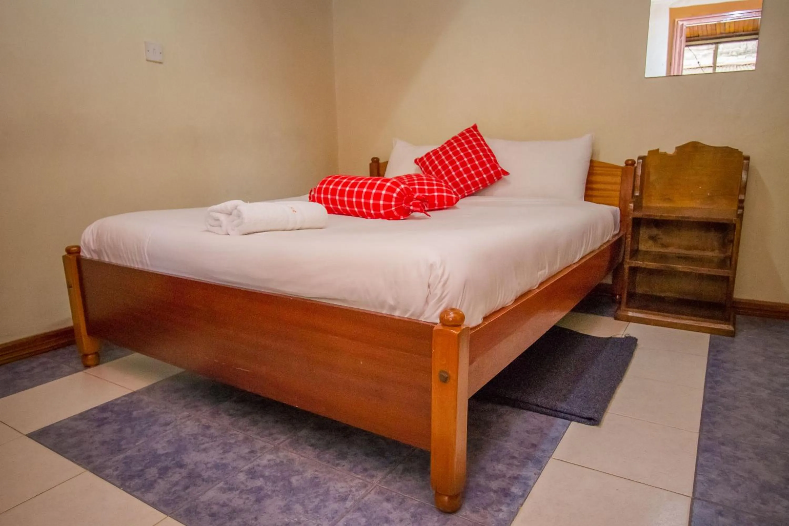 Bedroom in Sunshine Hotel Tengecha