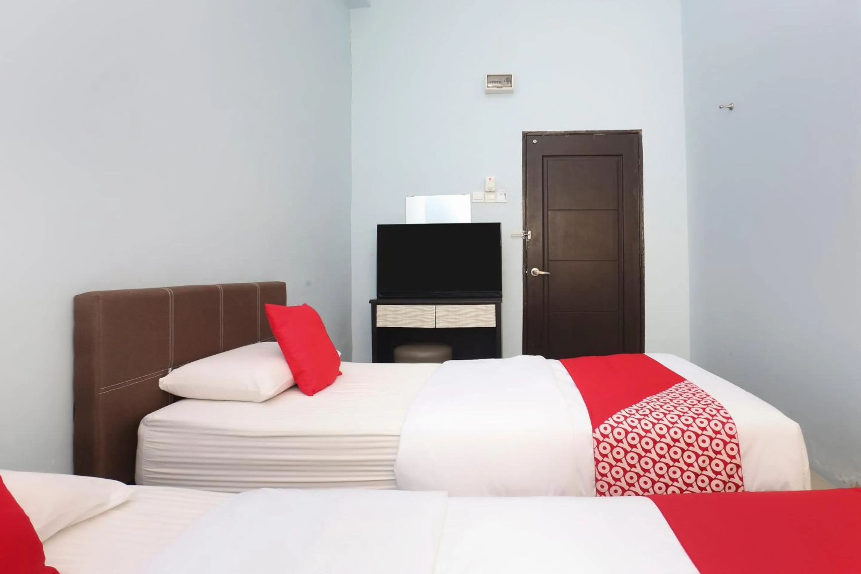 Bedroom, Bed in Hotel O Come Inn Premium