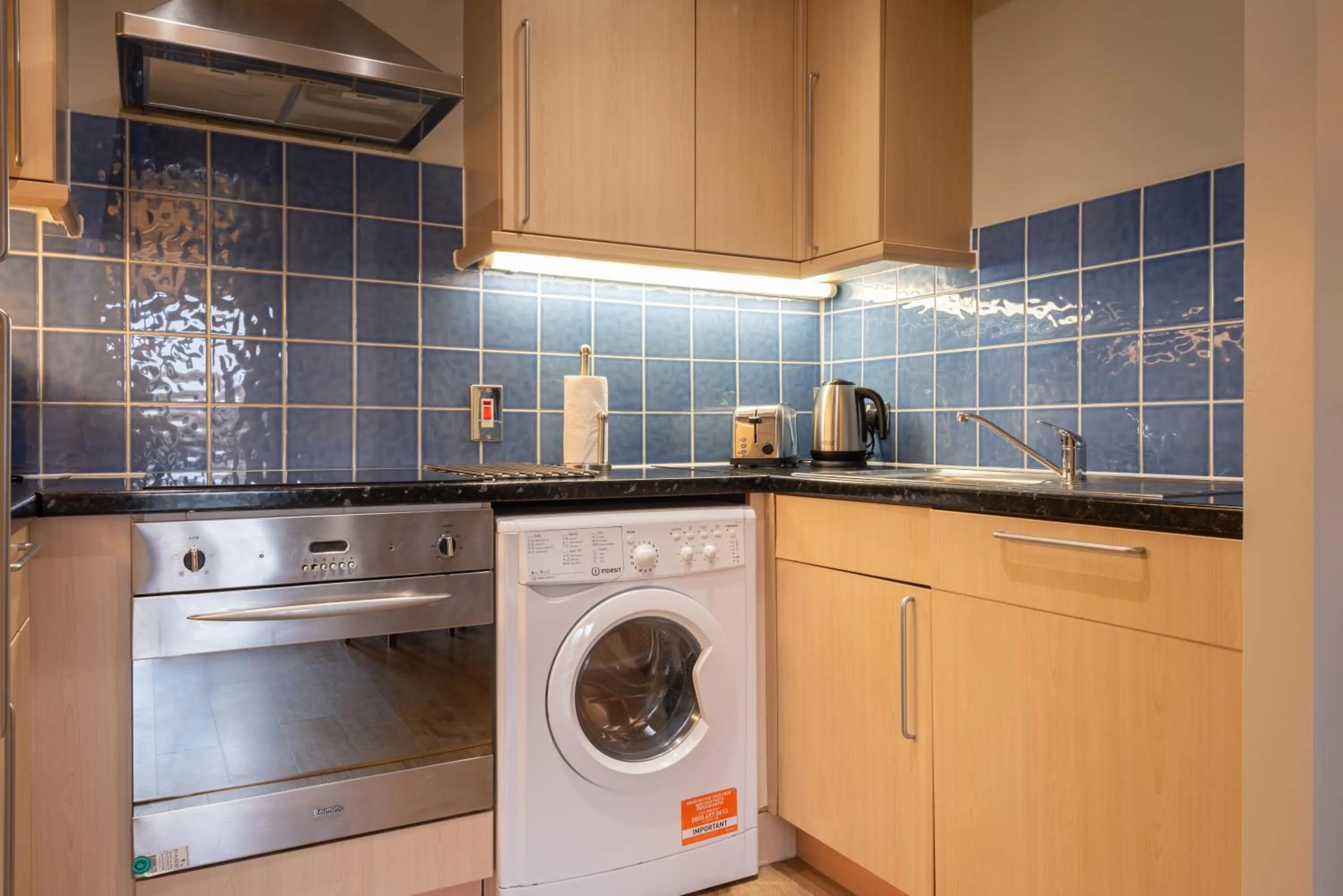 Kitchen or kitchenette in PREMIER SUITES Bristol Redcliffe