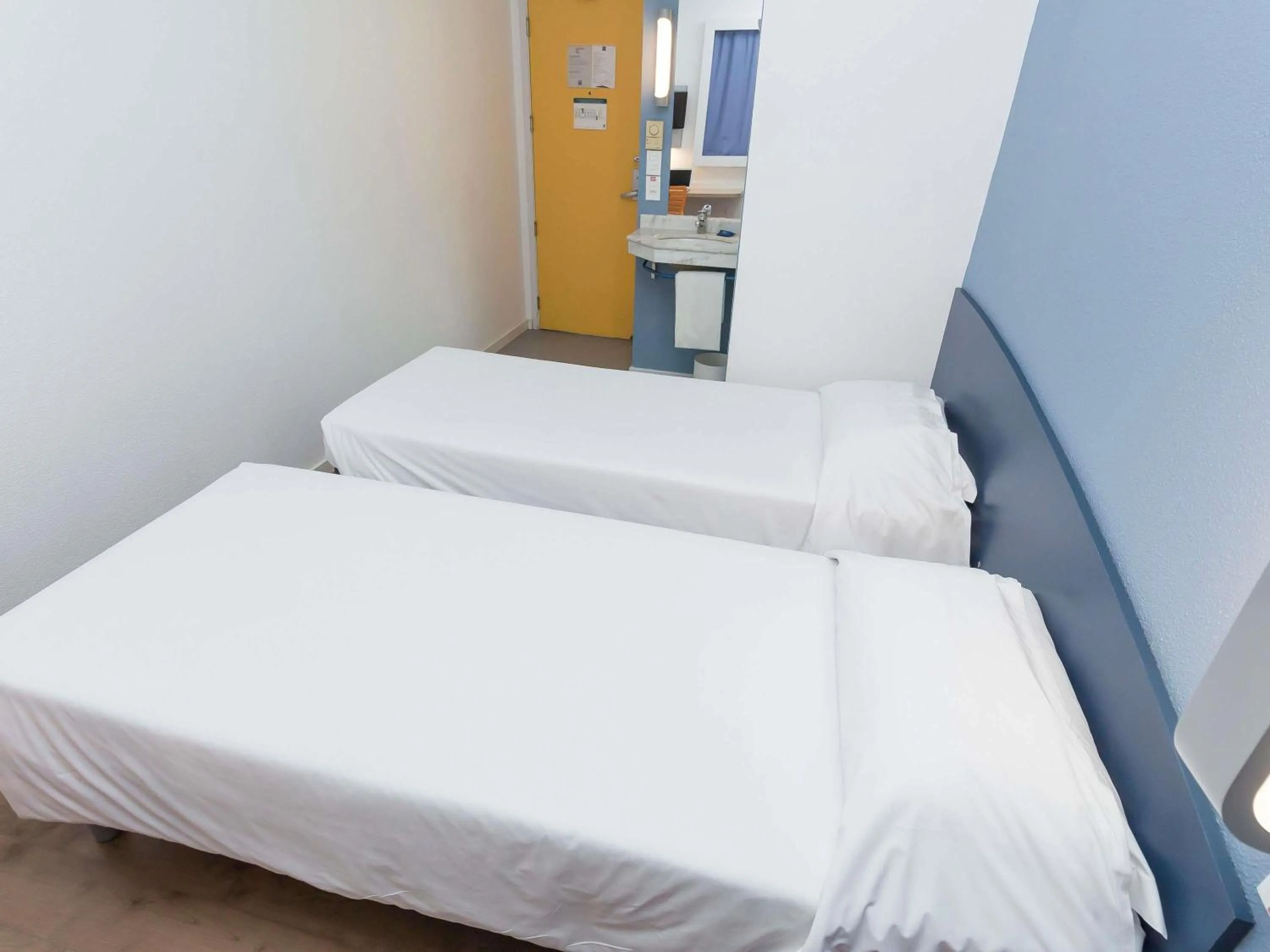 Bedroom, Bed in ibis budget Curitiba Centro