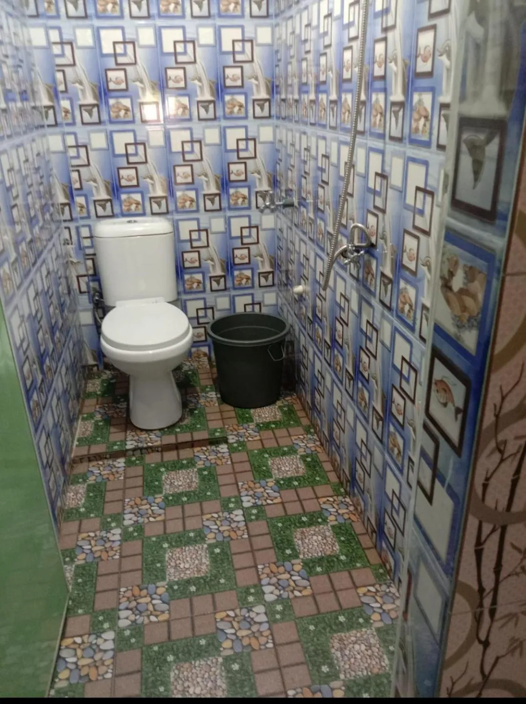 Toilet in Ustin Nagoya Bukit Lawang Orangutan Trekking & transport only book with us