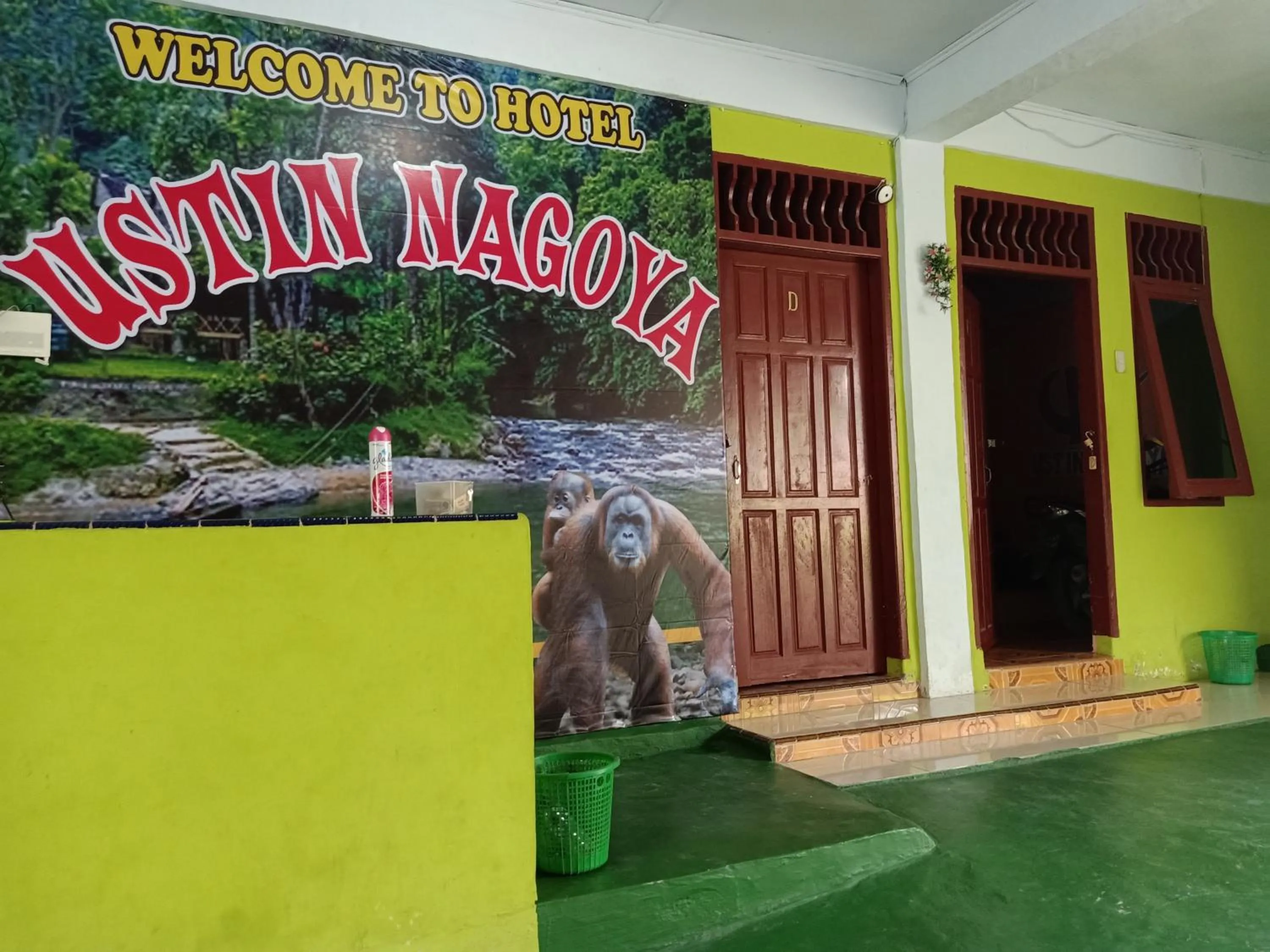 Property logo or sign in Ustin Nagoya Bukit Lawang Orangutan Trekking & transport only book with us