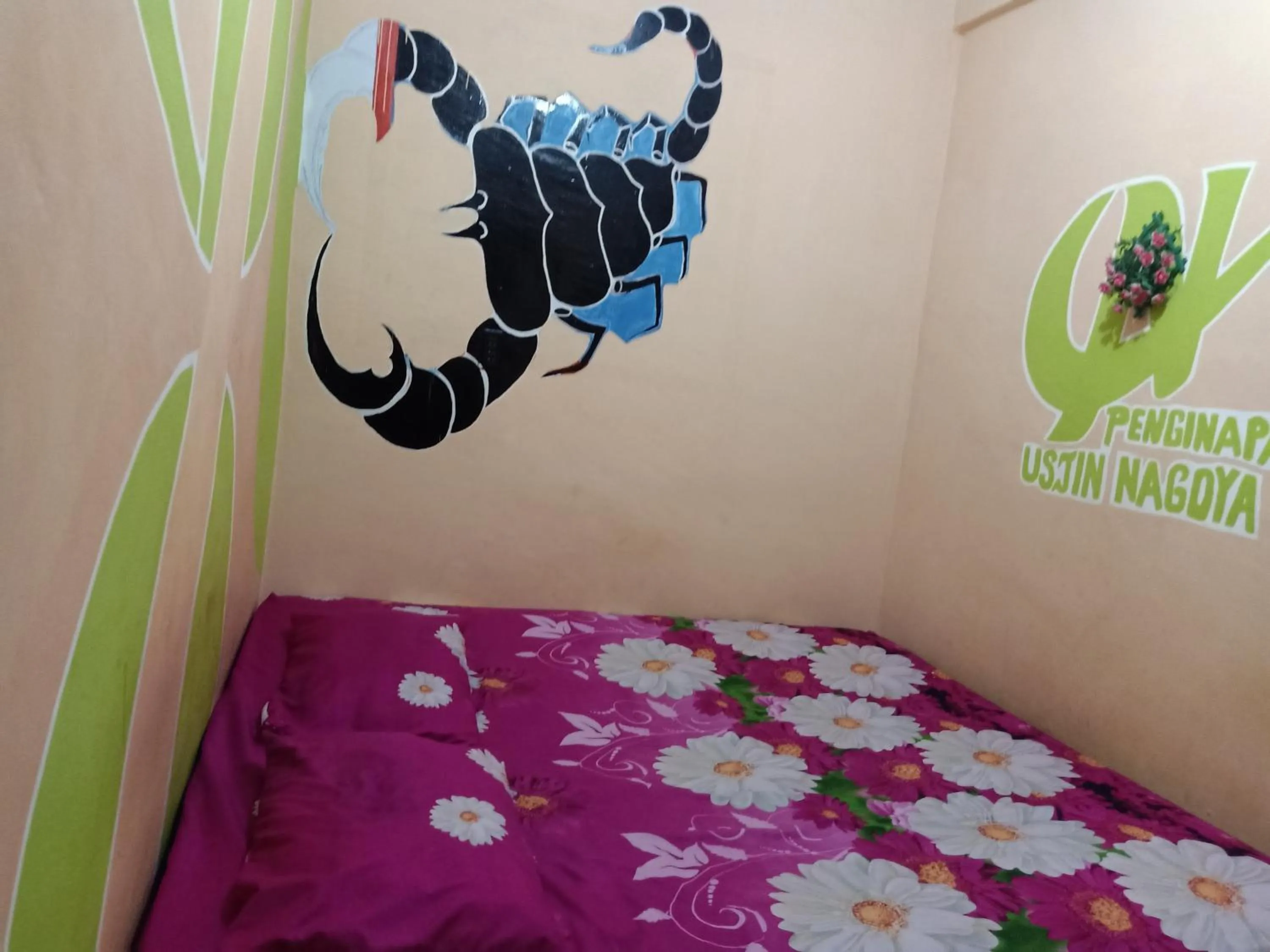 Bed in Ustin Nagoya Bukit Lawang Orangutan Trekking & transport only book with us