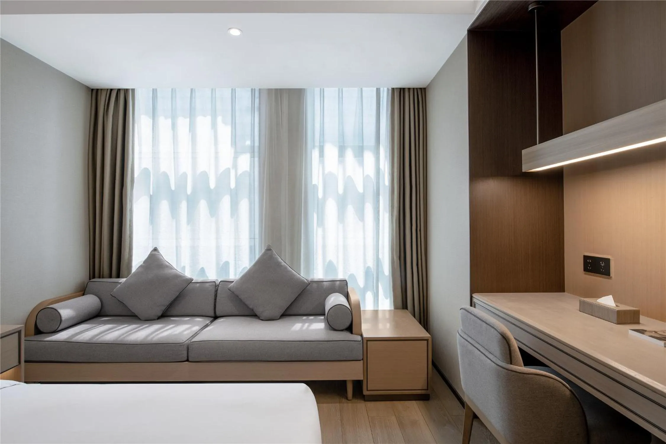 Living room, Bed in JOYA Hotel Chengdu High Technology