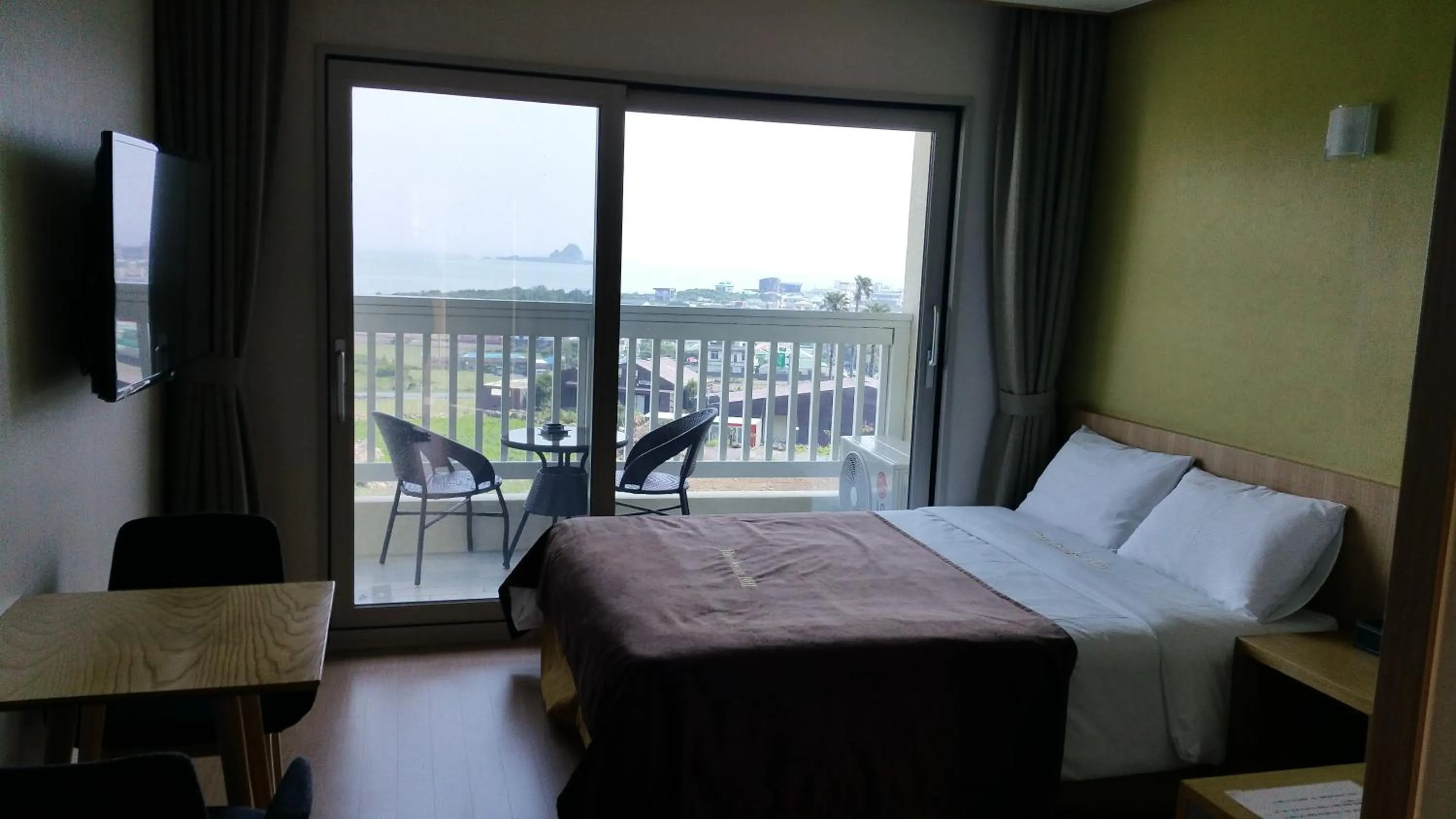 Bed in Jeju the Ocean Hill Pension