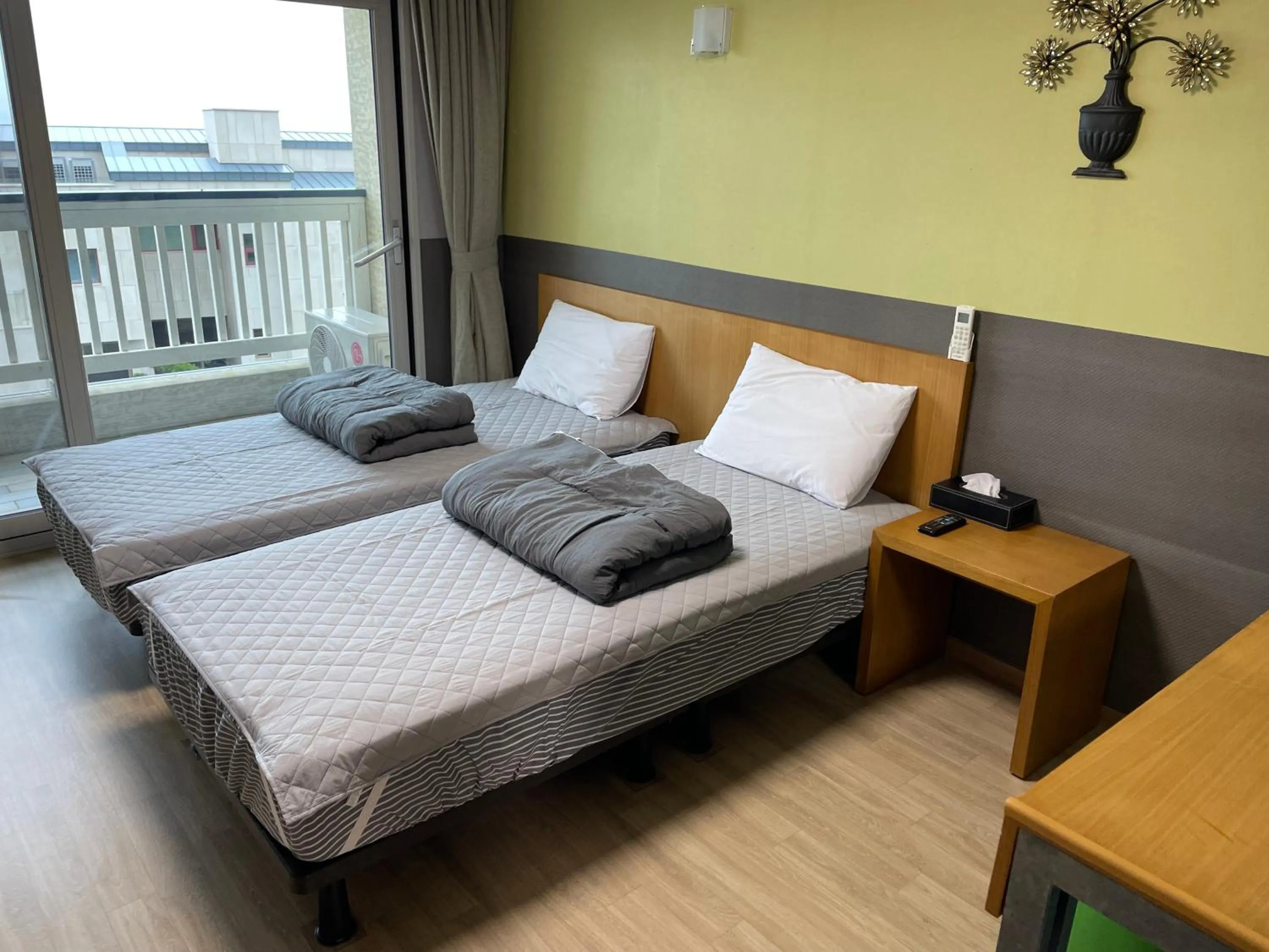 Bed in Jeju the Ocean Hill Pension