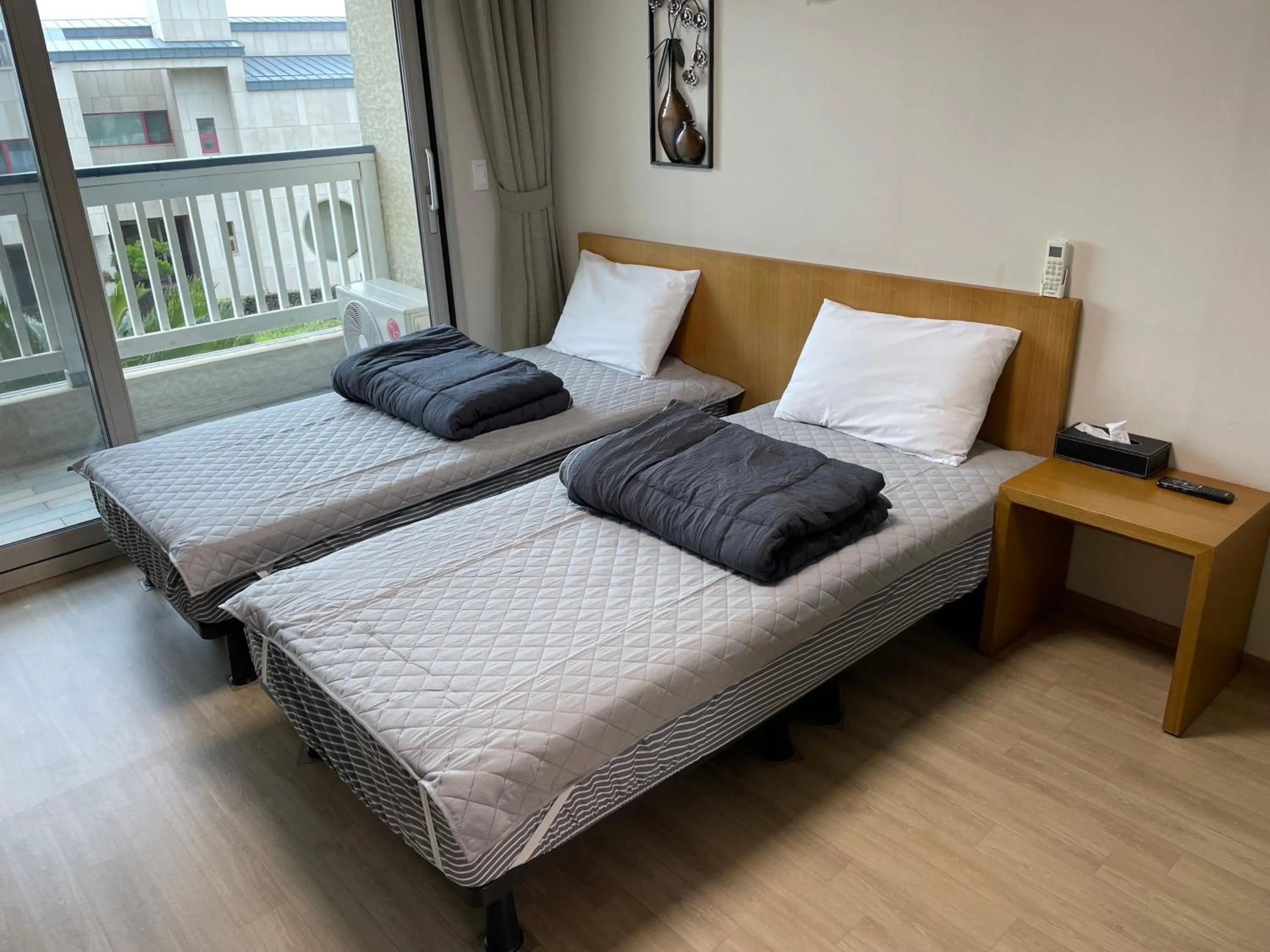 Bed in Jeju the Ocean Hill Pension