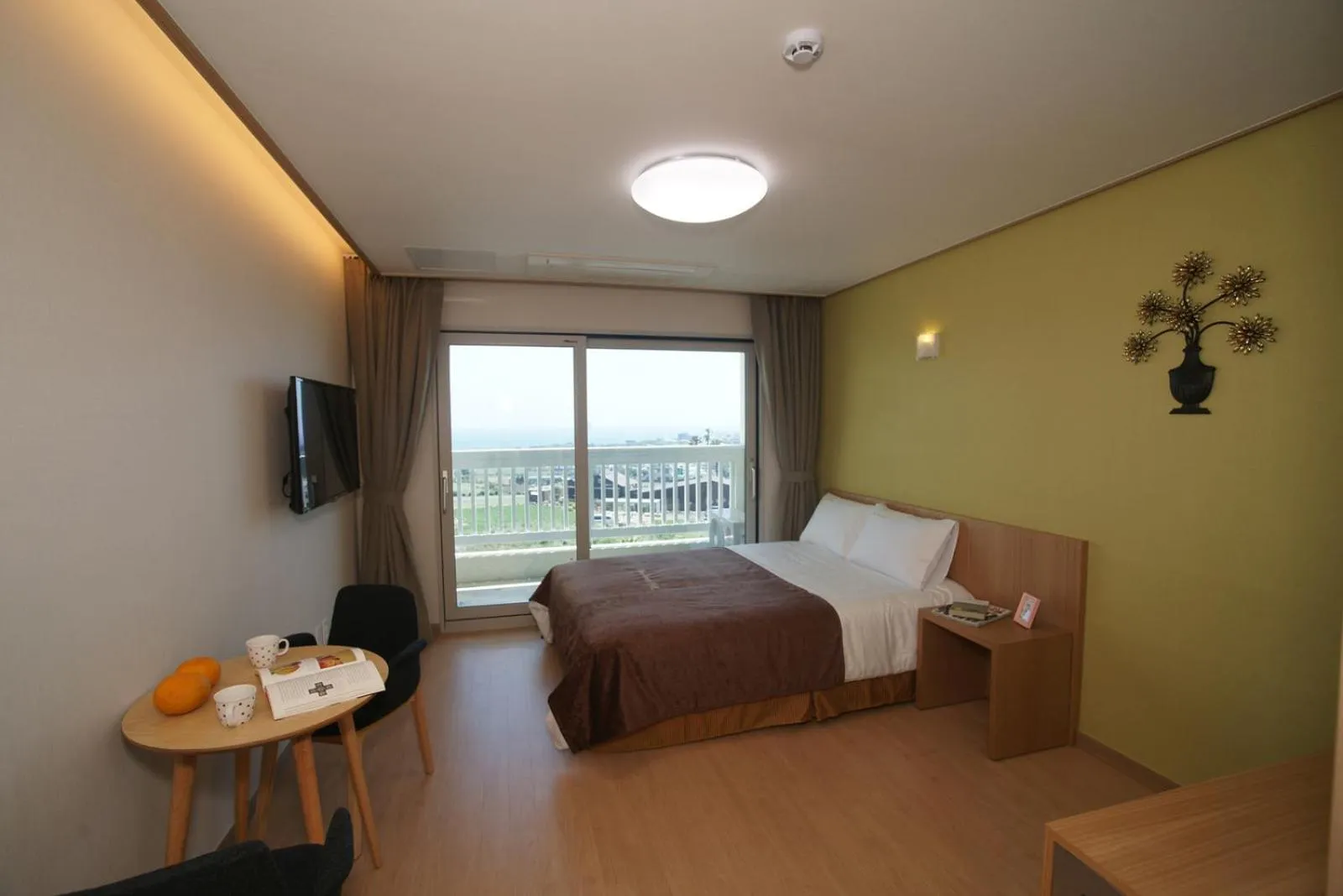 Bed in Jeju the Ocean Hill Pension