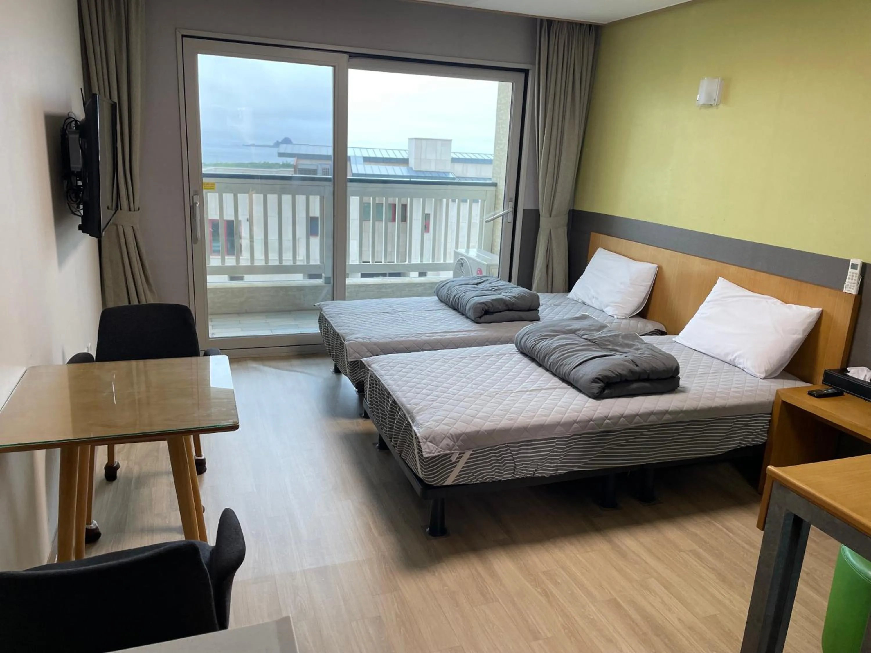 Bed in Jeju the Ocean Hill Pension