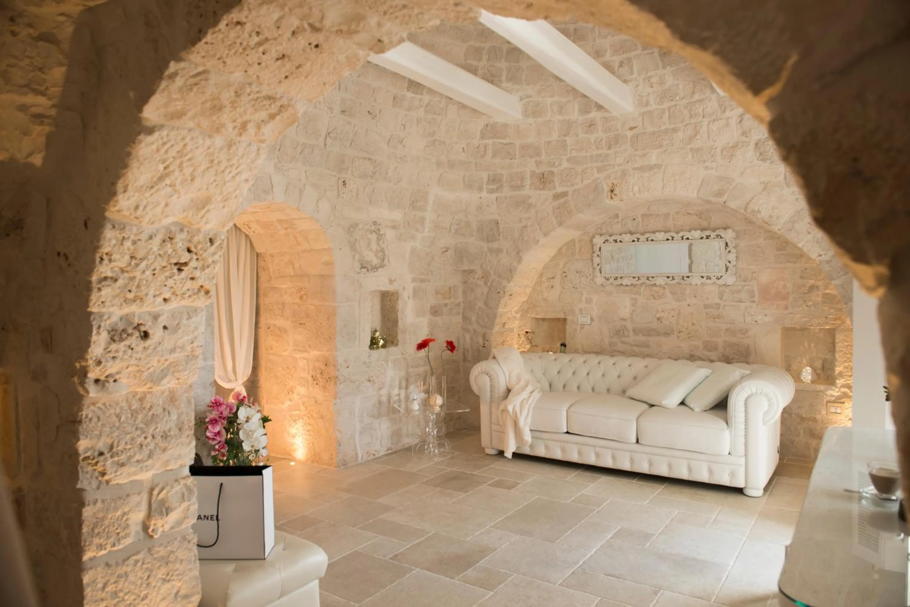 Dining area, Bed in Trulli Resort