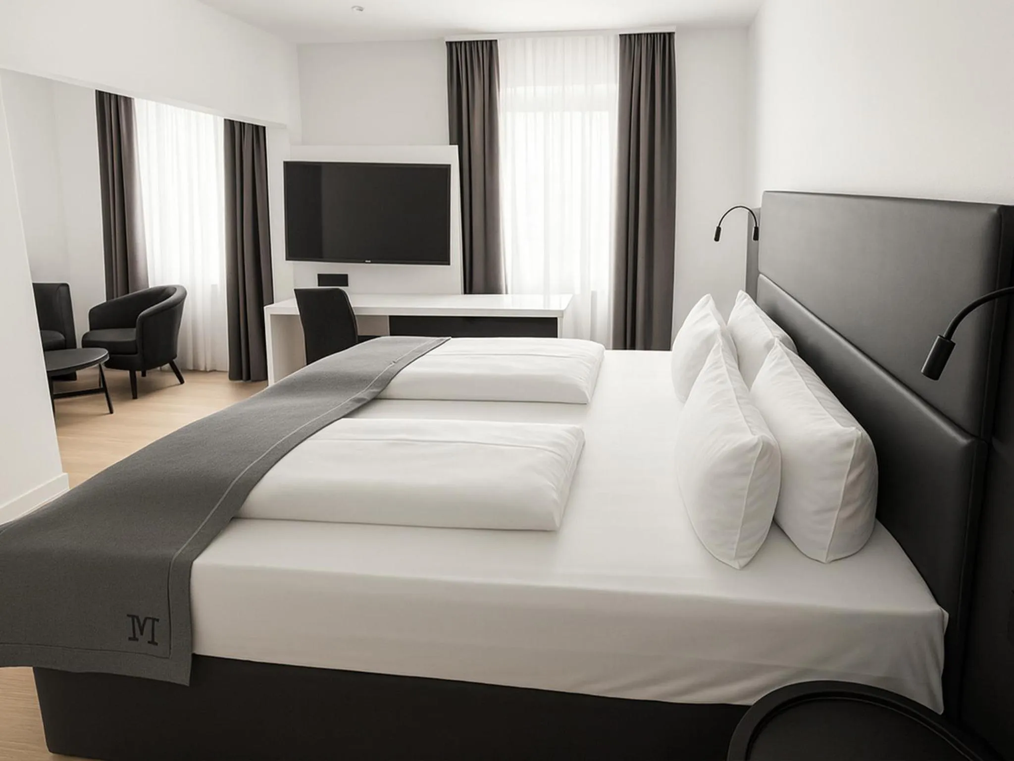 Photo of the whole room, Bed in DORMERO Hotel Wilhelmshaven