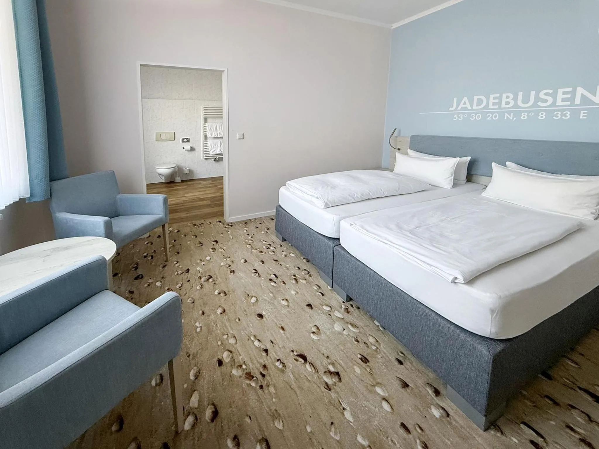 Bed in DORMERO Hotel Wilhelmshaven