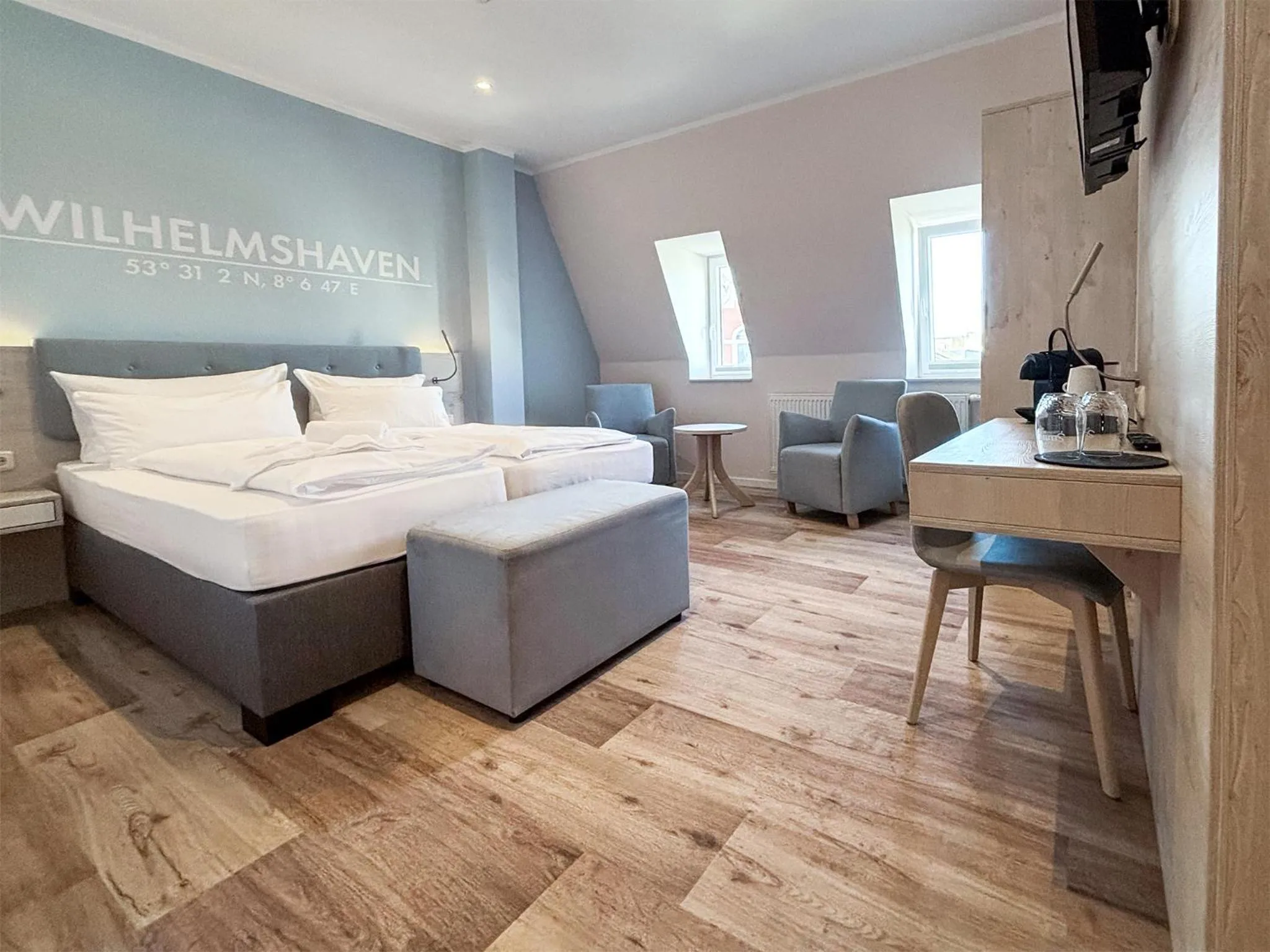 Bed in DORMERO Hotel Wilhelmshaven