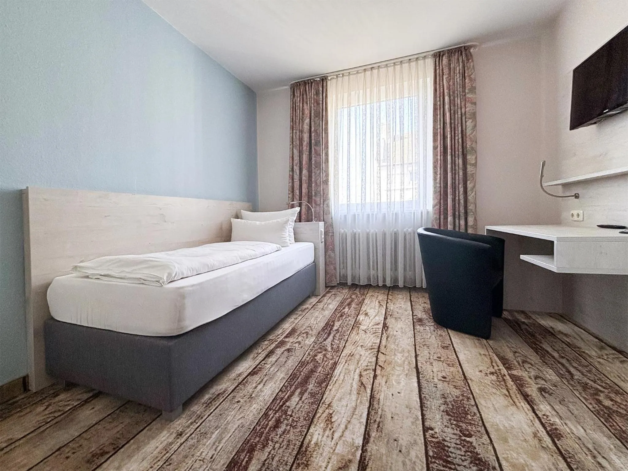 Photo of the whole room, Bed in DORMERO Hotel Wilhelmshaven