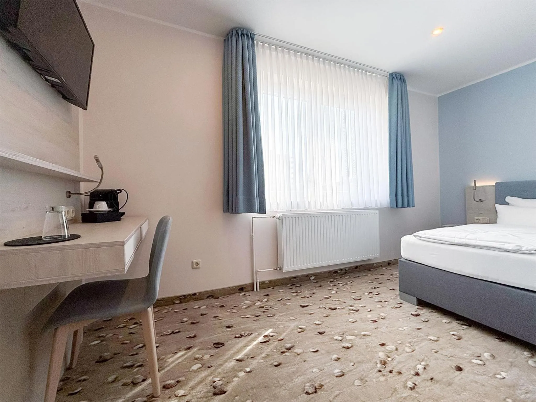 Photo of the whole room, Bed in DORMERO Hotel Wilhelmshaven