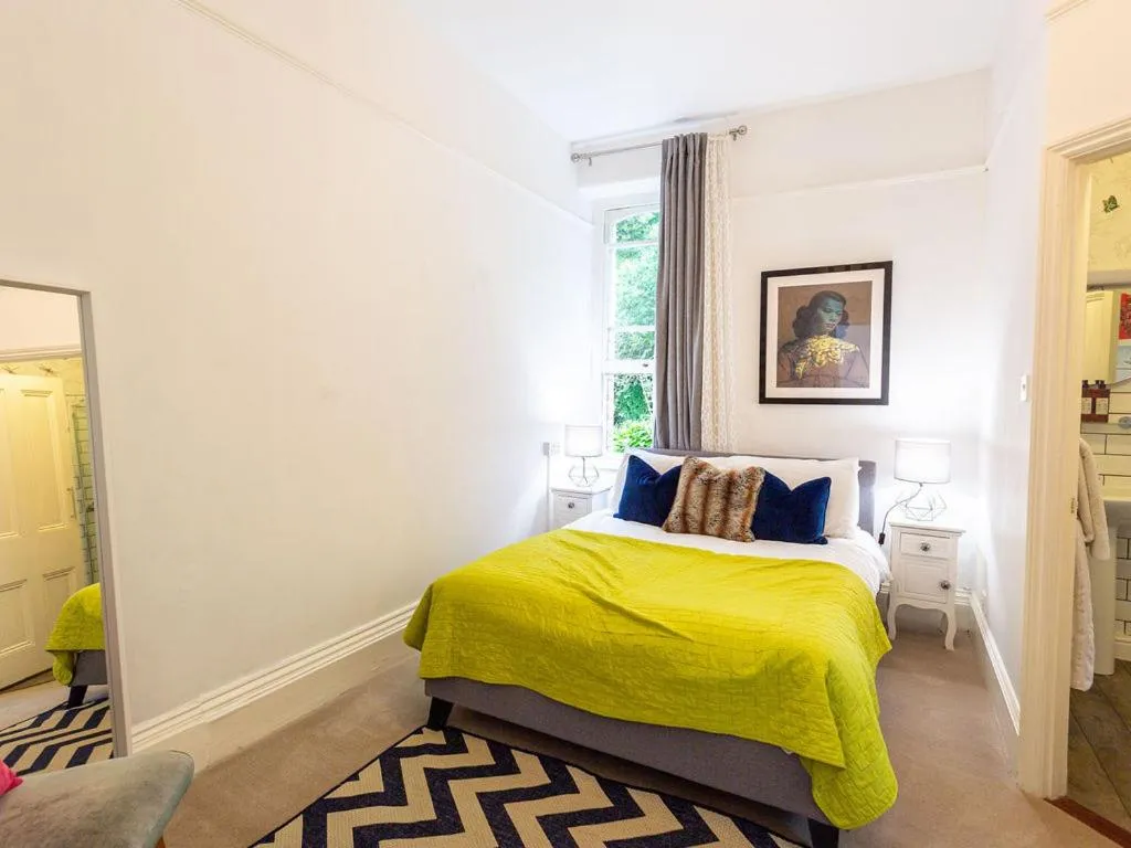Bed in Norbury House Stylish Accommodation