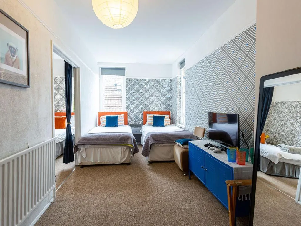 Bed in Norbury House Stylish Accommodation