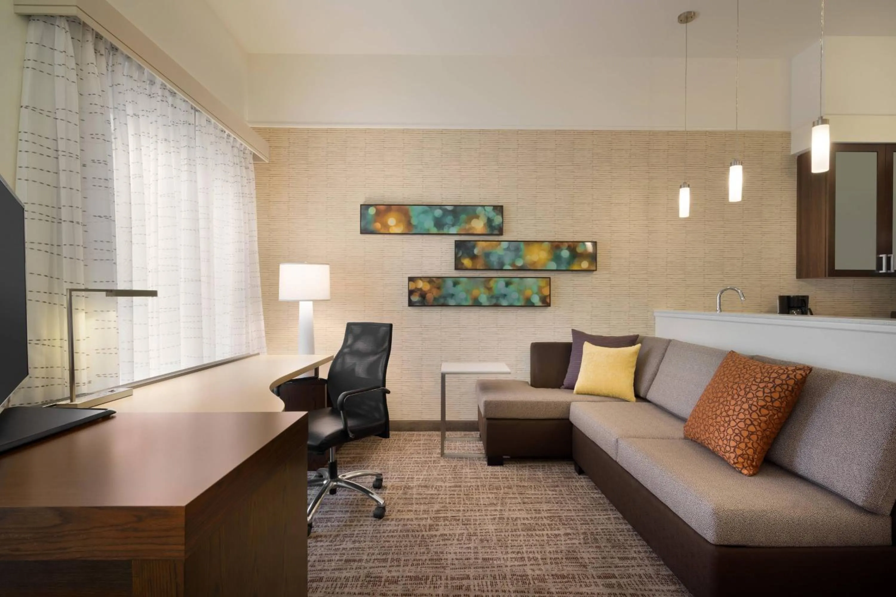 Living room in Residence Inn by Marriott Winston-Salem Hanes Mall