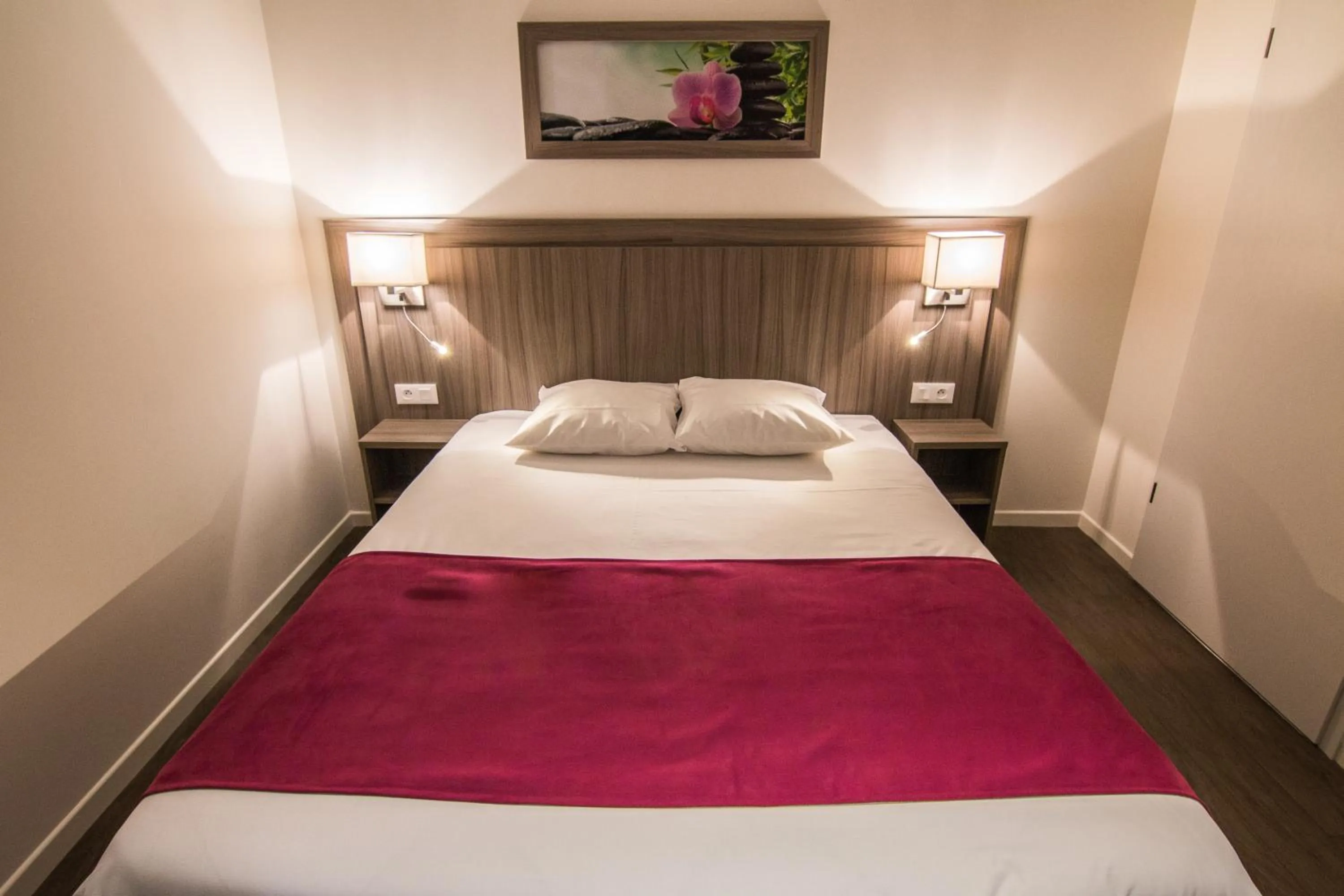 Bed in Tulip Inn Thionville Residences