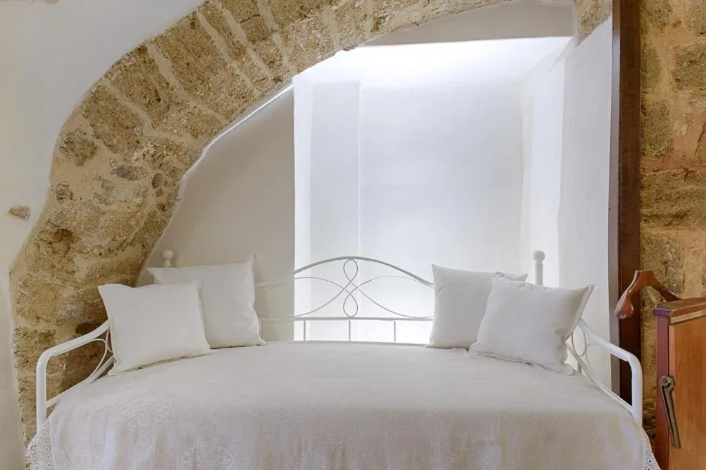 Bed in Sacratum B&B Suite Spa