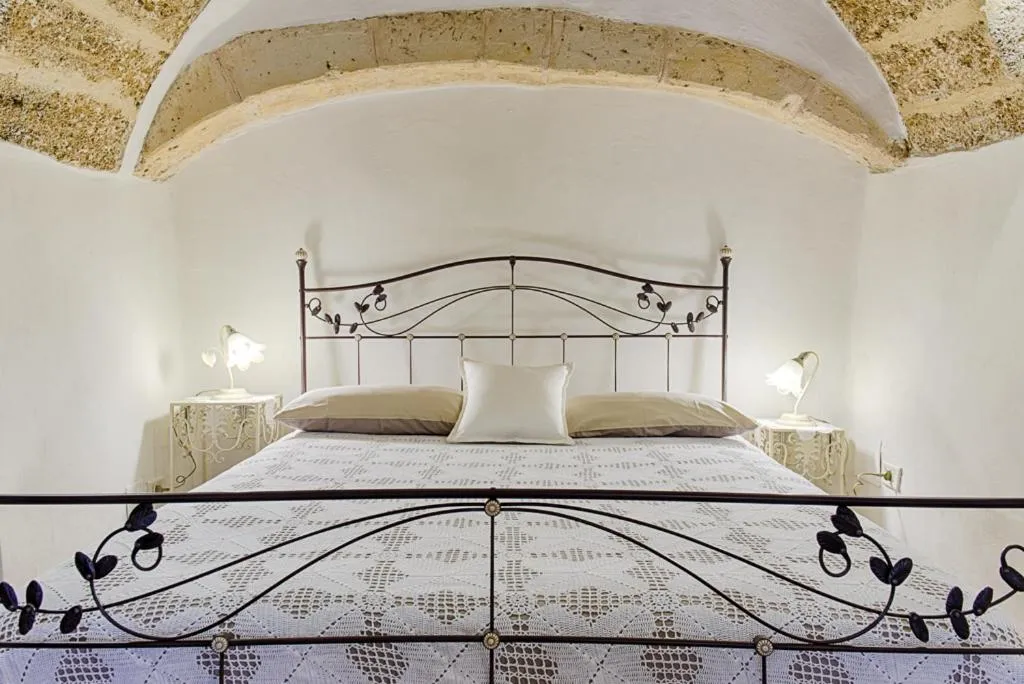 Bed in Sacratum B&B Suite Spa
