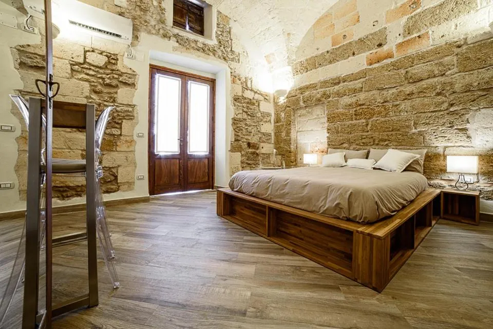Bed in Sacratum B&B Suite Spa