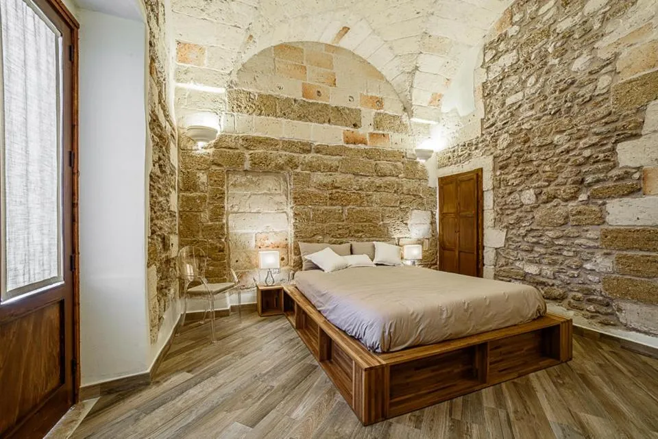 Bed in Sacratum B&B Suite Spa