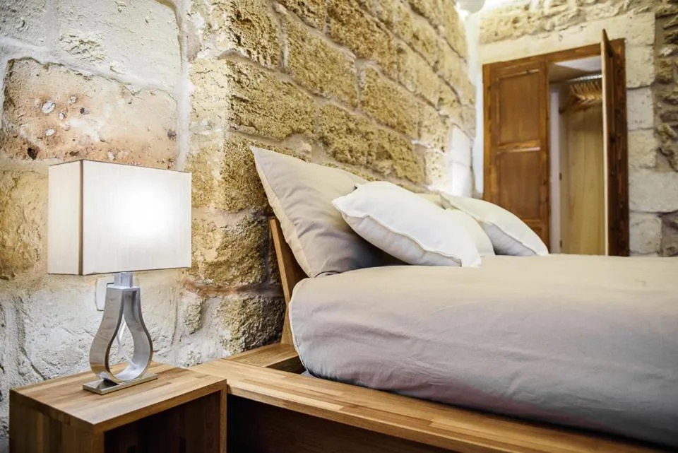 Bed in Sacratum B&B Suite Spa