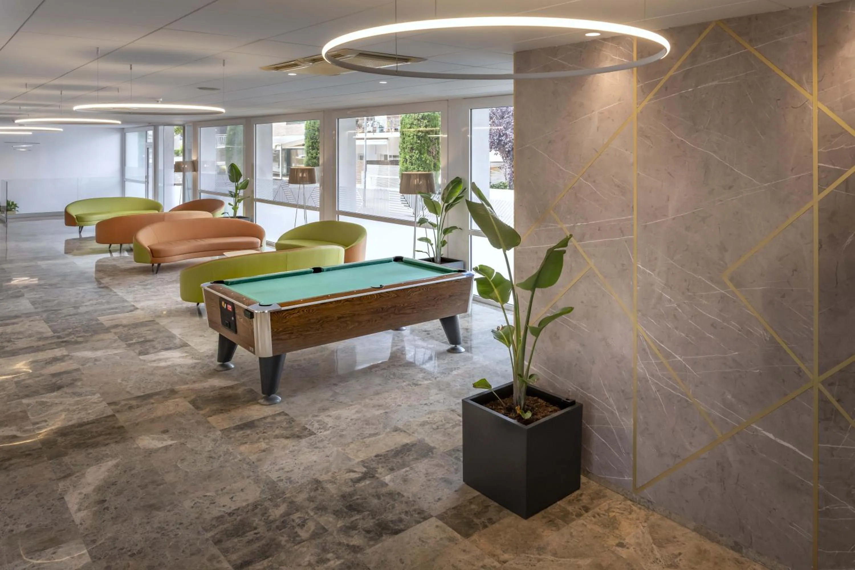 Communal lounge/ TV room in GHT Costa Brava & Spa