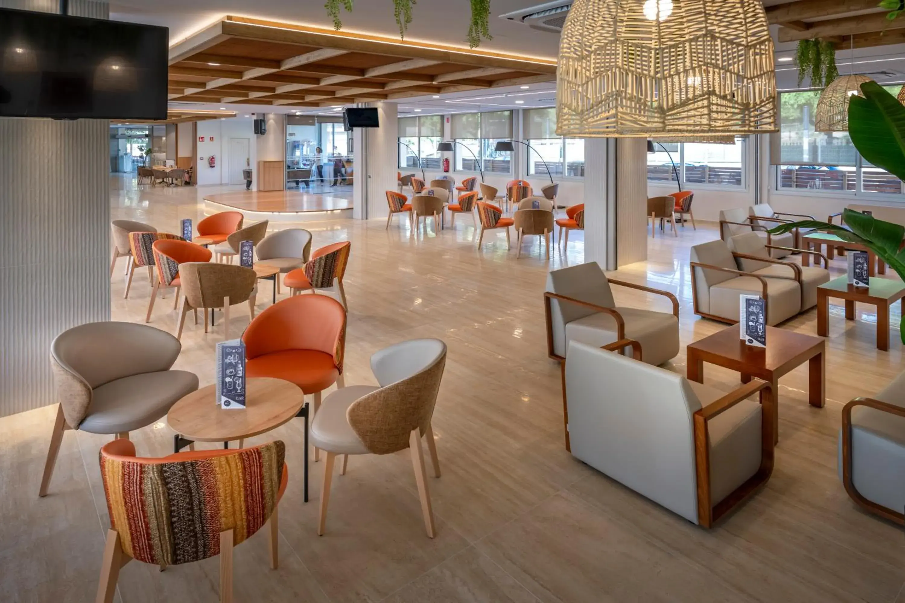 Lounge or bar in GHT Oasis Tossa & Spa Lounge or bar in GHT Oasis Tossa & Spa