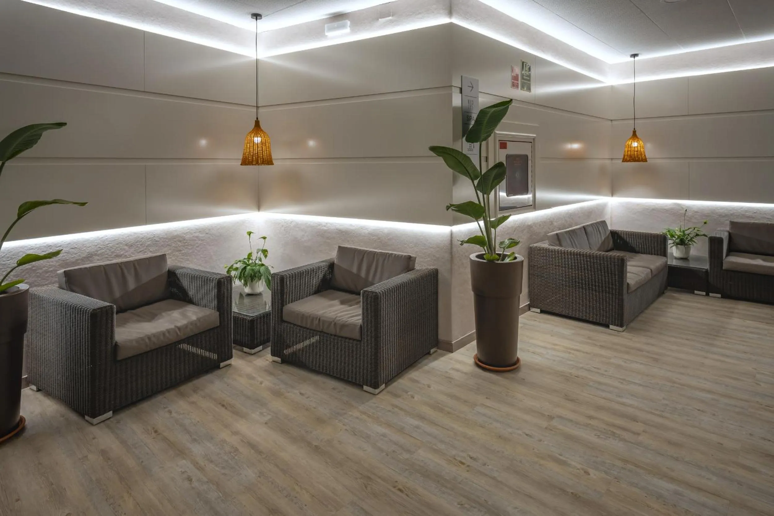 Seating area in GHT Oasis Tossa & Spa