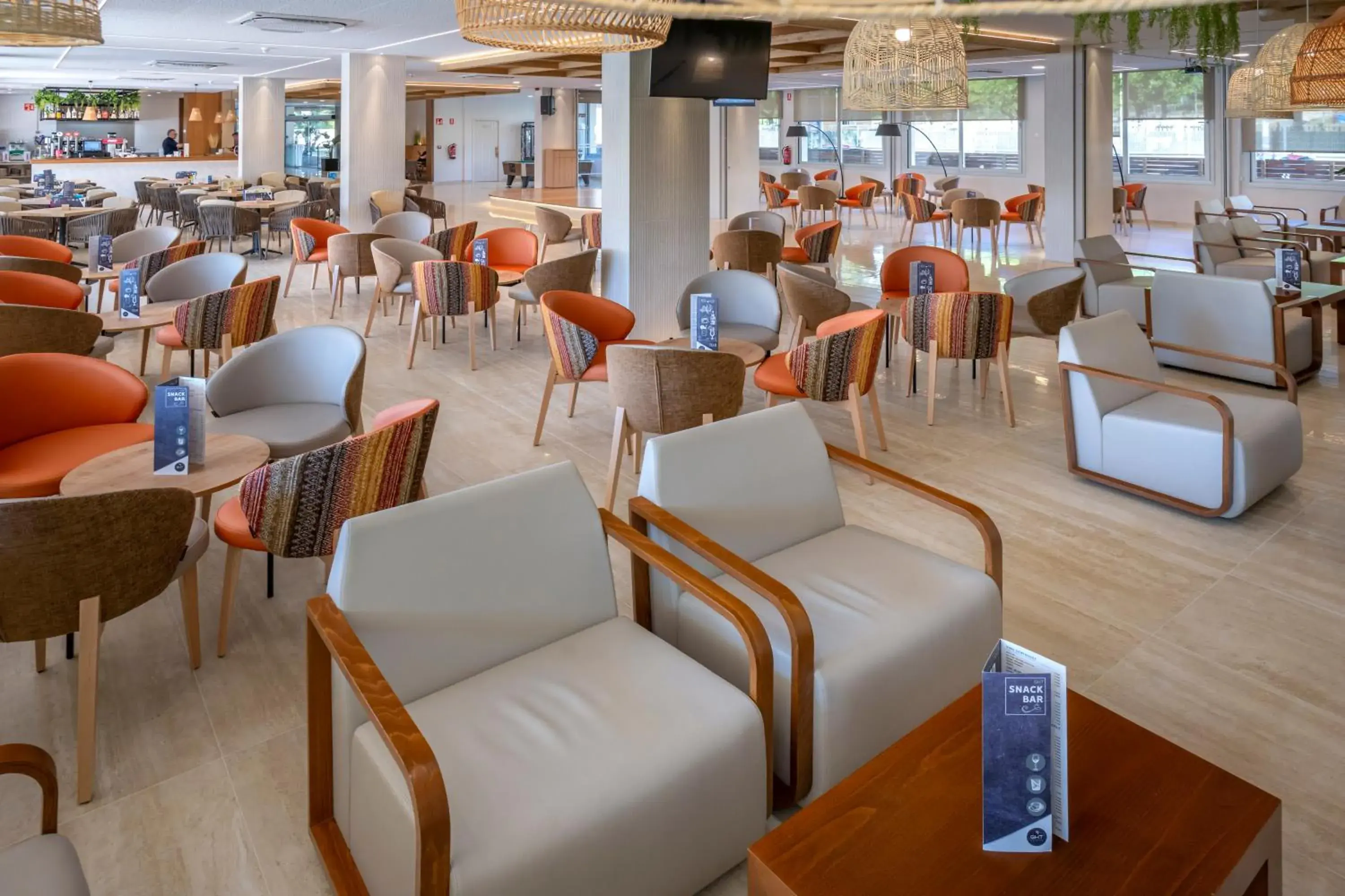 Lounge or bar in GHT Oasis Tossa & Spa Lounge or bar in GHT Oasis Tossa & Spa