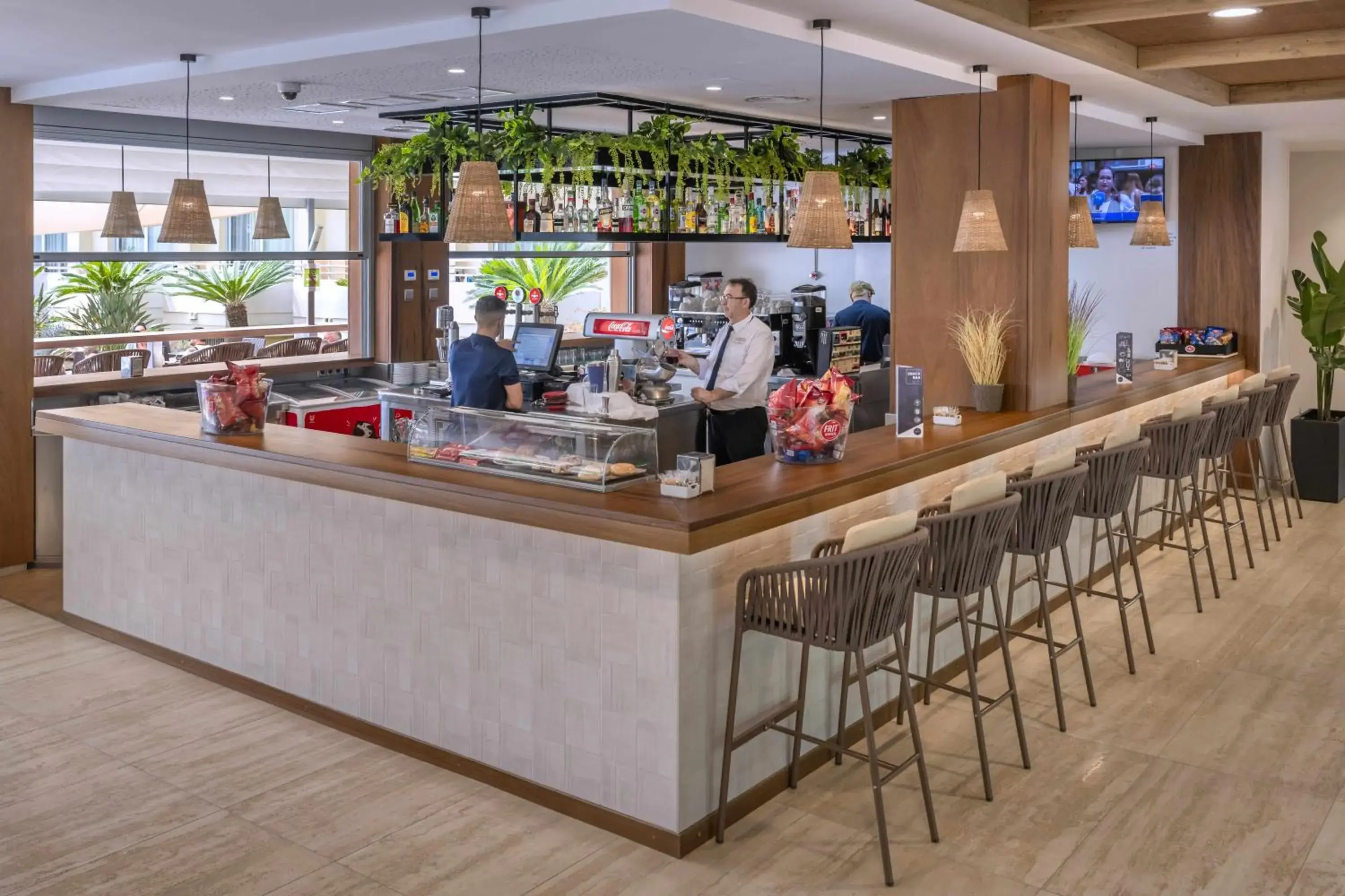 Lounge or bar in GHT Oasis Tossa & Spa Lounge or bar in GHT Oasis Tossa & Spa