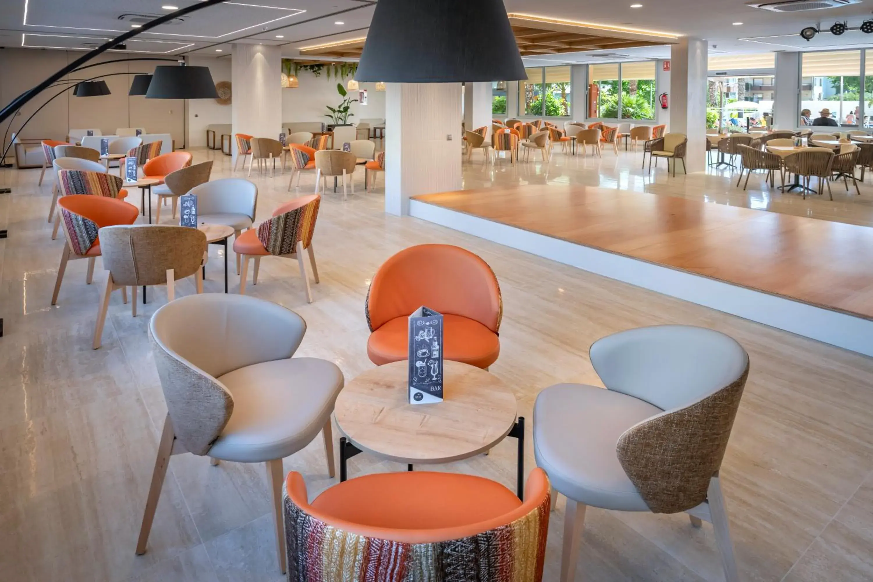 Lounge or bar in GHT Oasis Tossa & Spa Lounge or bar in GHT Oasis Tossa & Spa