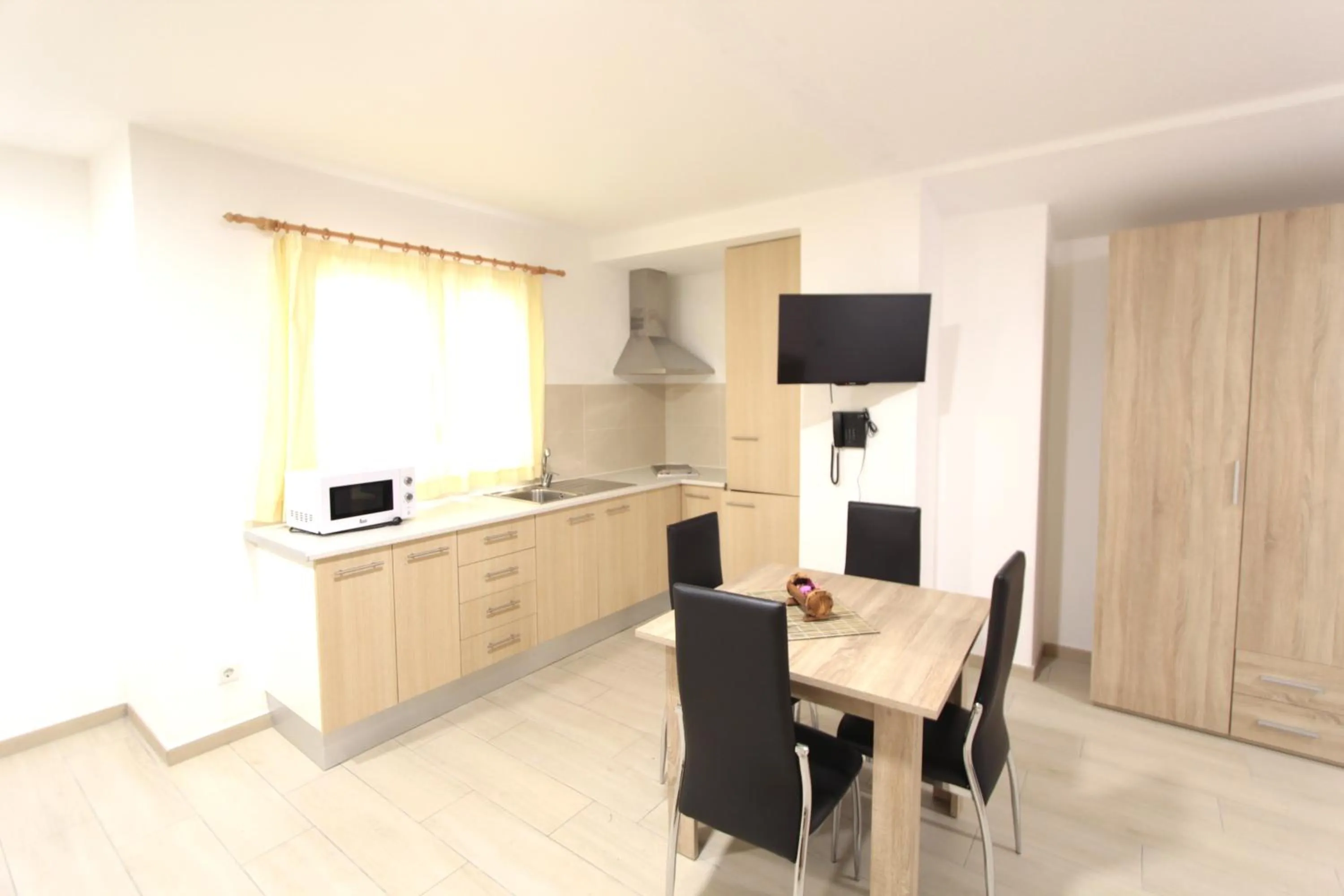 Dining area in Apartamentos Giuliano