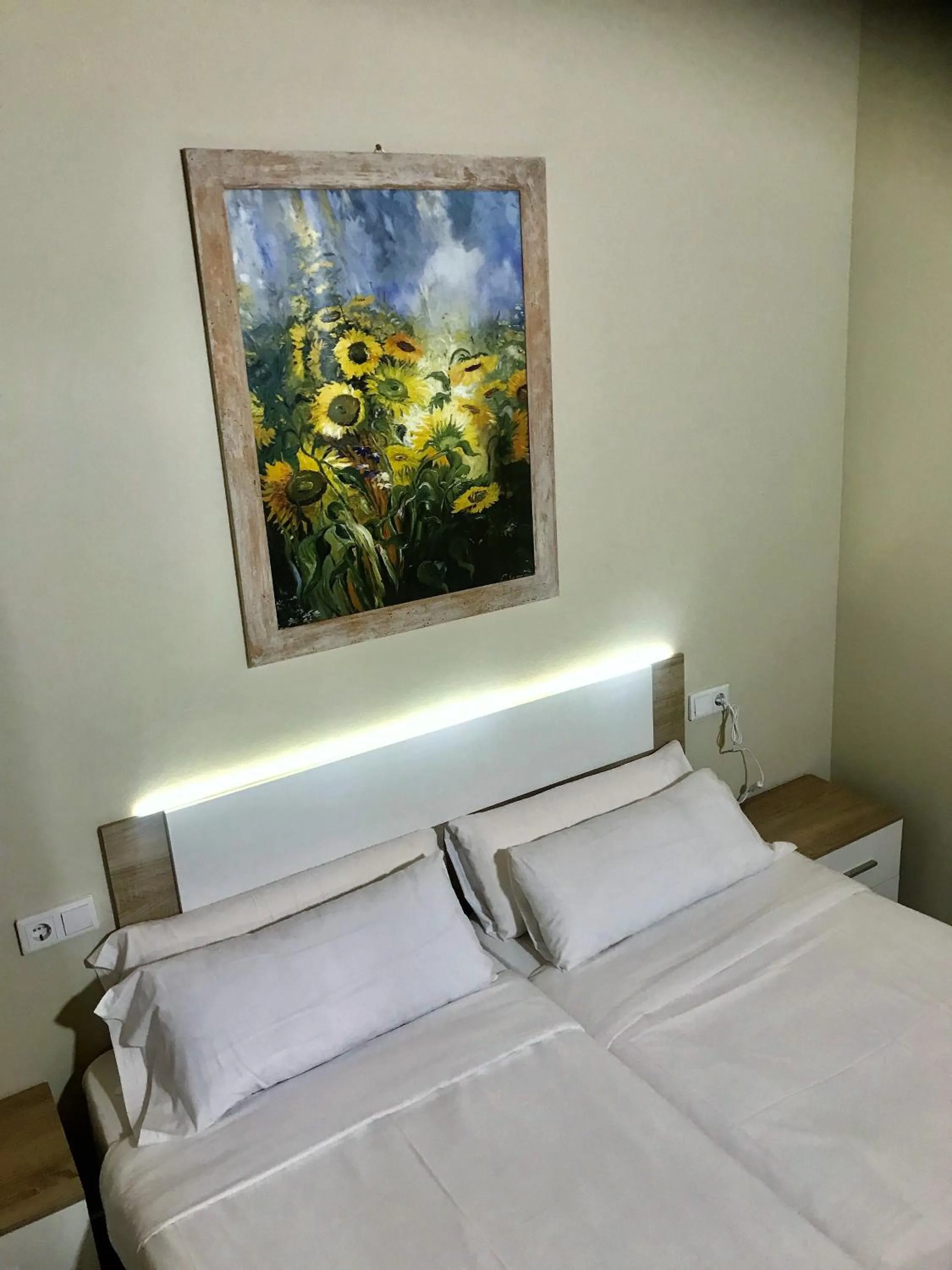 Bed in Apartamentos Giuliano