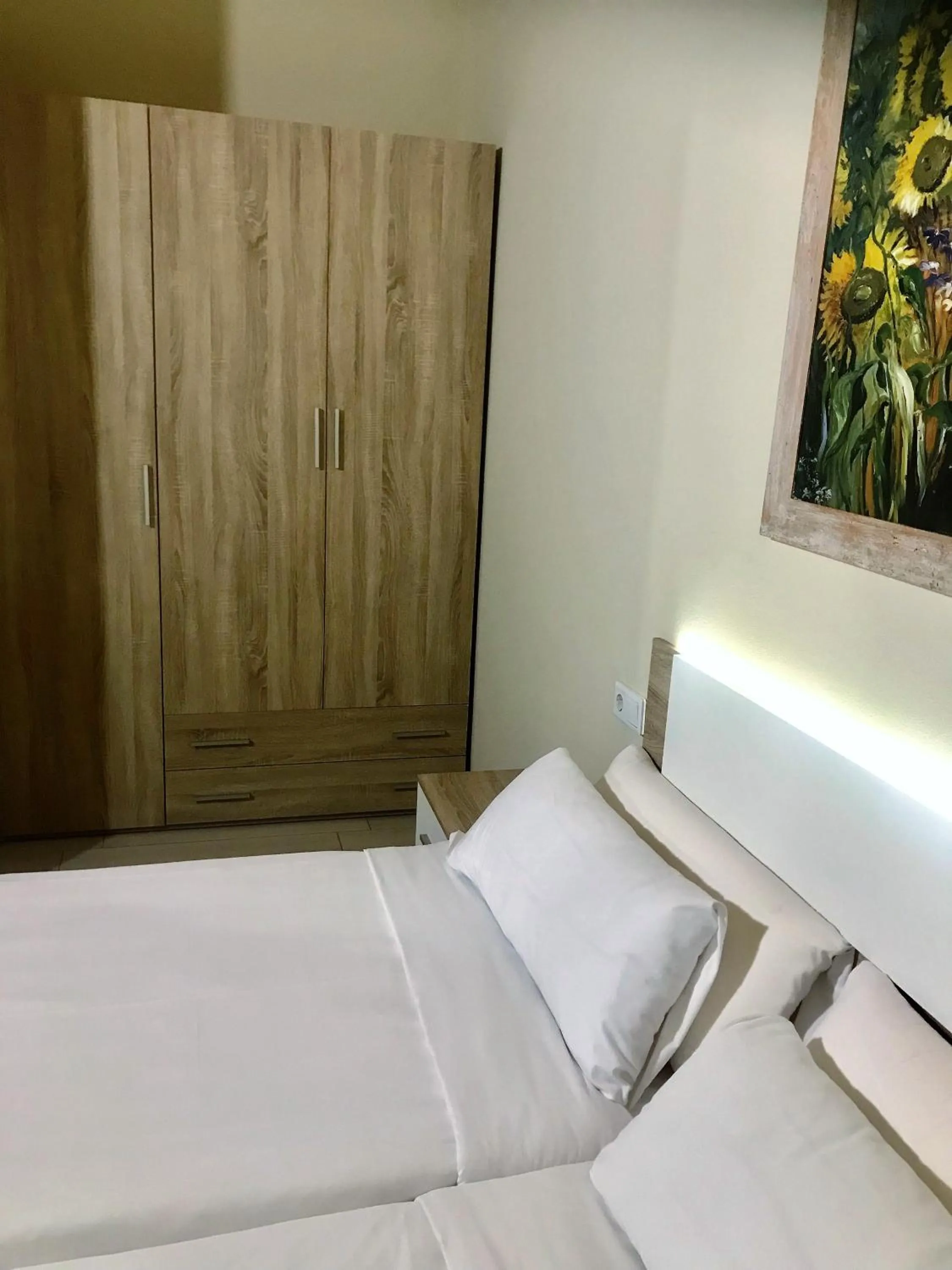 Bed in Apartamentos Giuliano