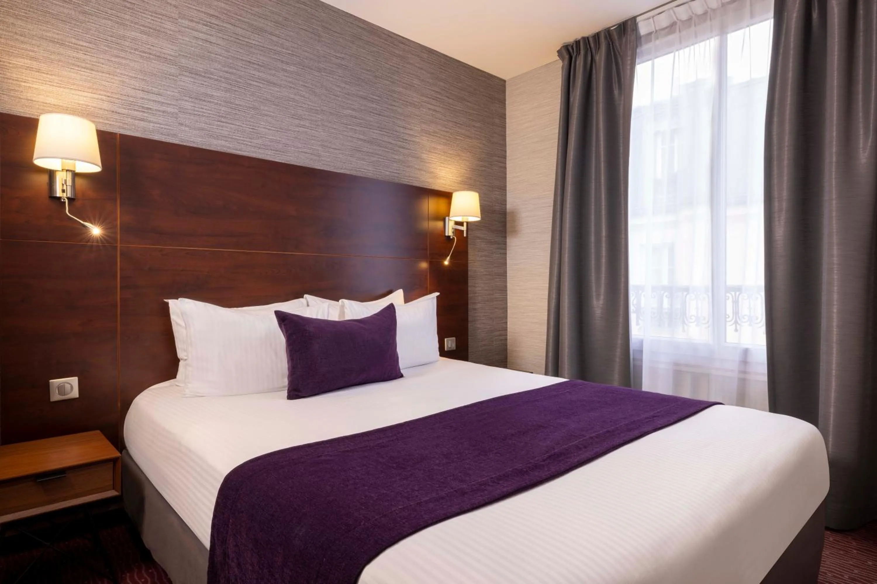 Bed in Hôtel L'Interlude