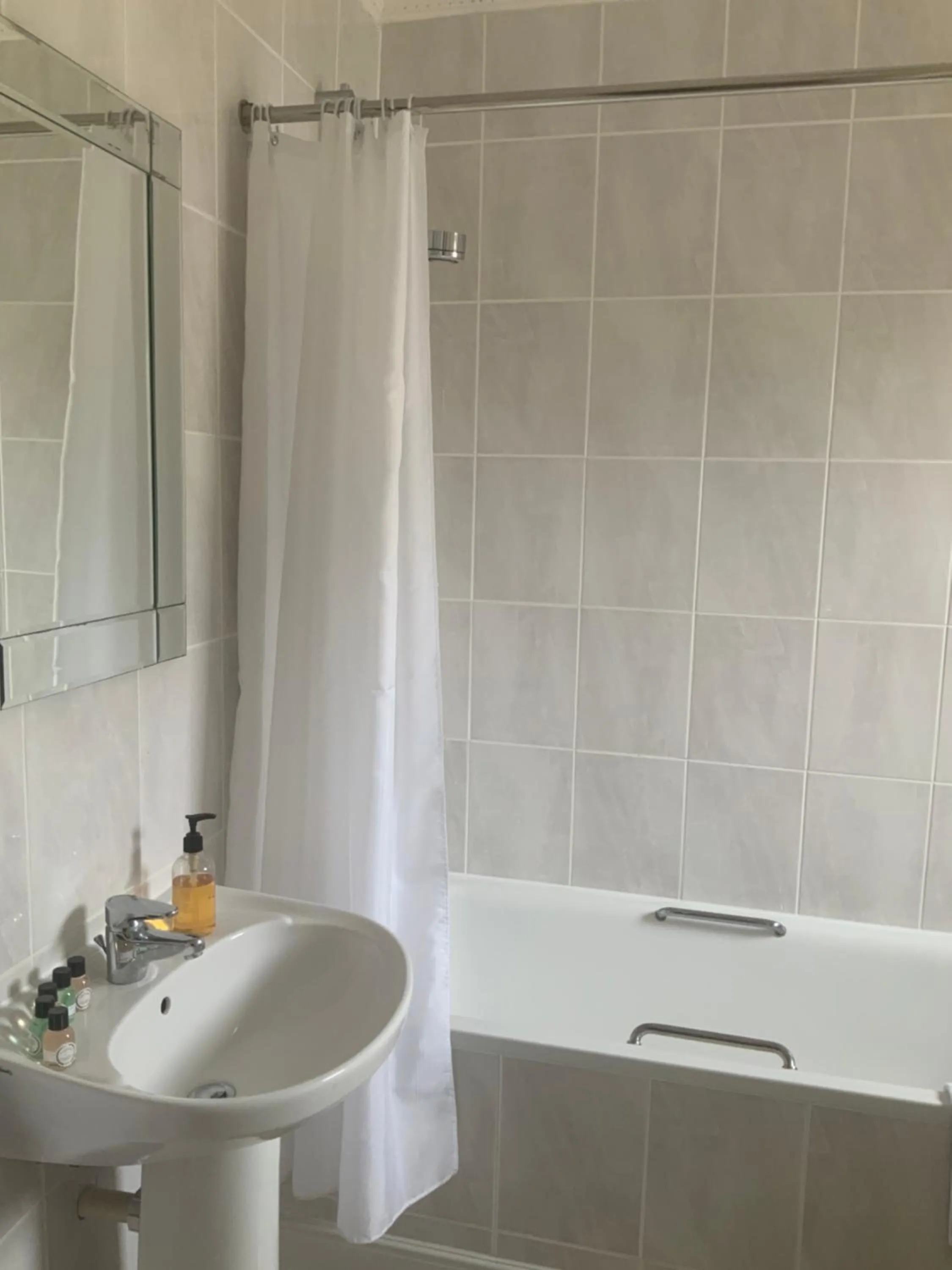 Bathroom in Marina Metro Hotel