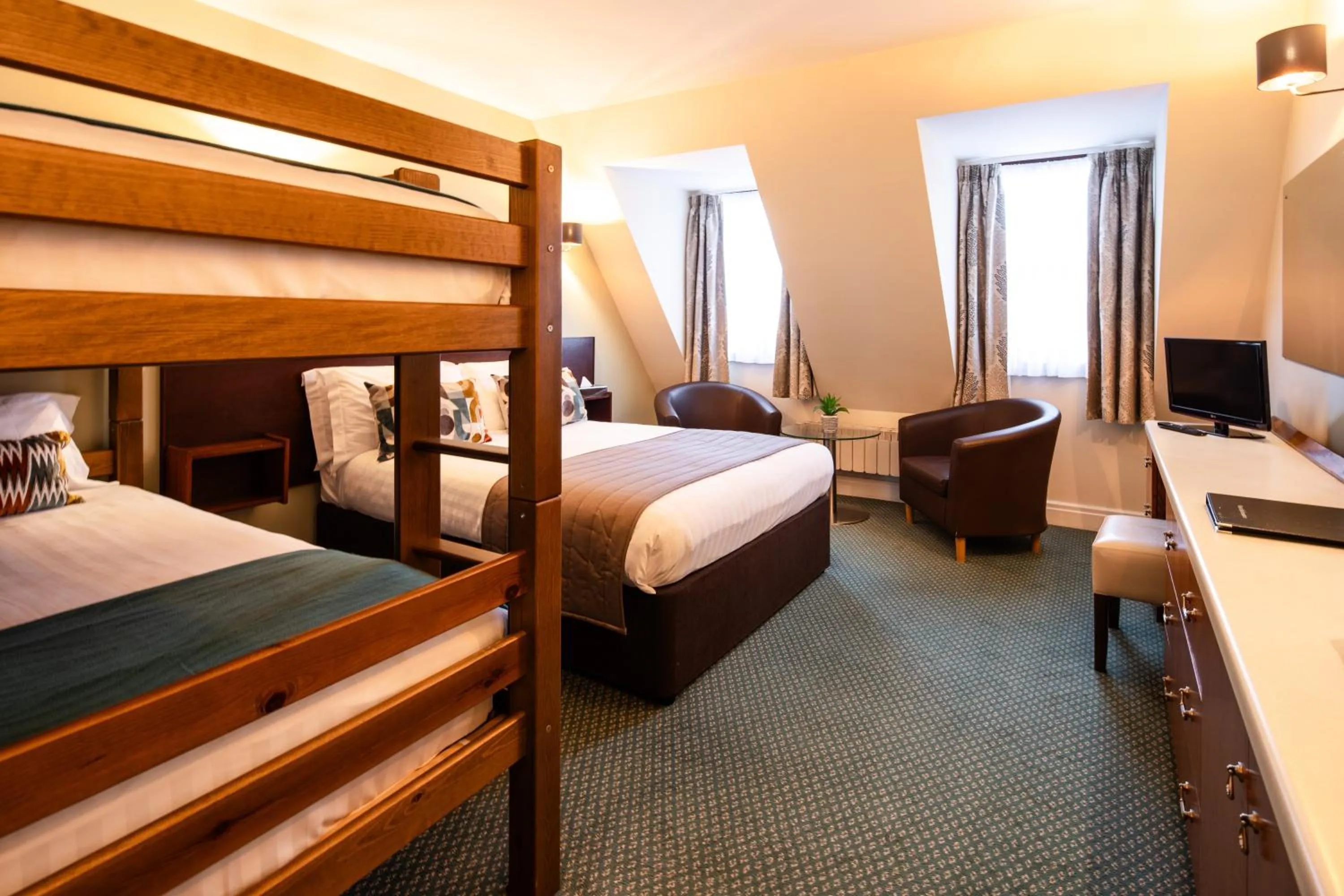 Bed in The Norfolk Lodge Hotel