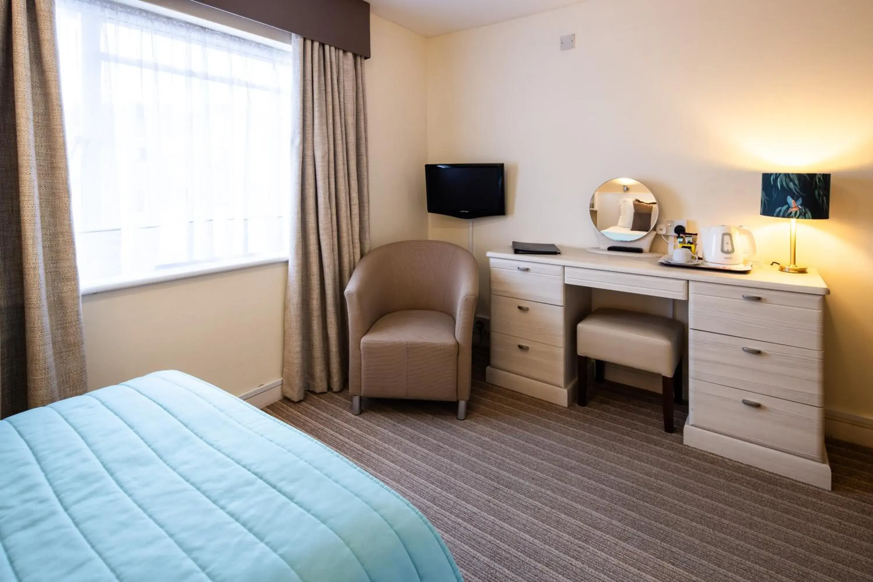 Bed in The Norfolk Lodge Hotel Bed in The Norfolk Lodge Hotel