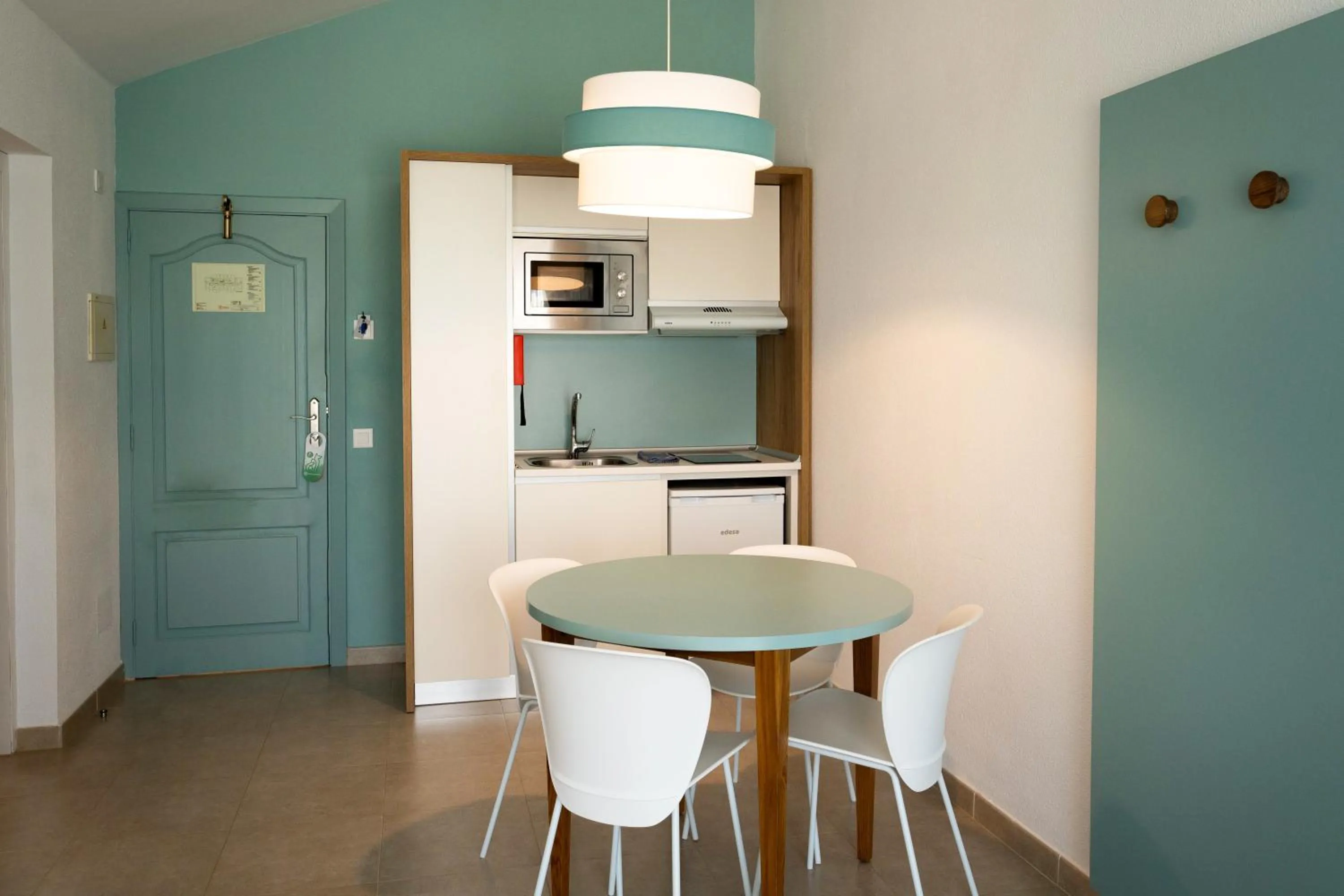 Kitchen or kitchenette in Pierre & Vacances Menorca Cala Blanes