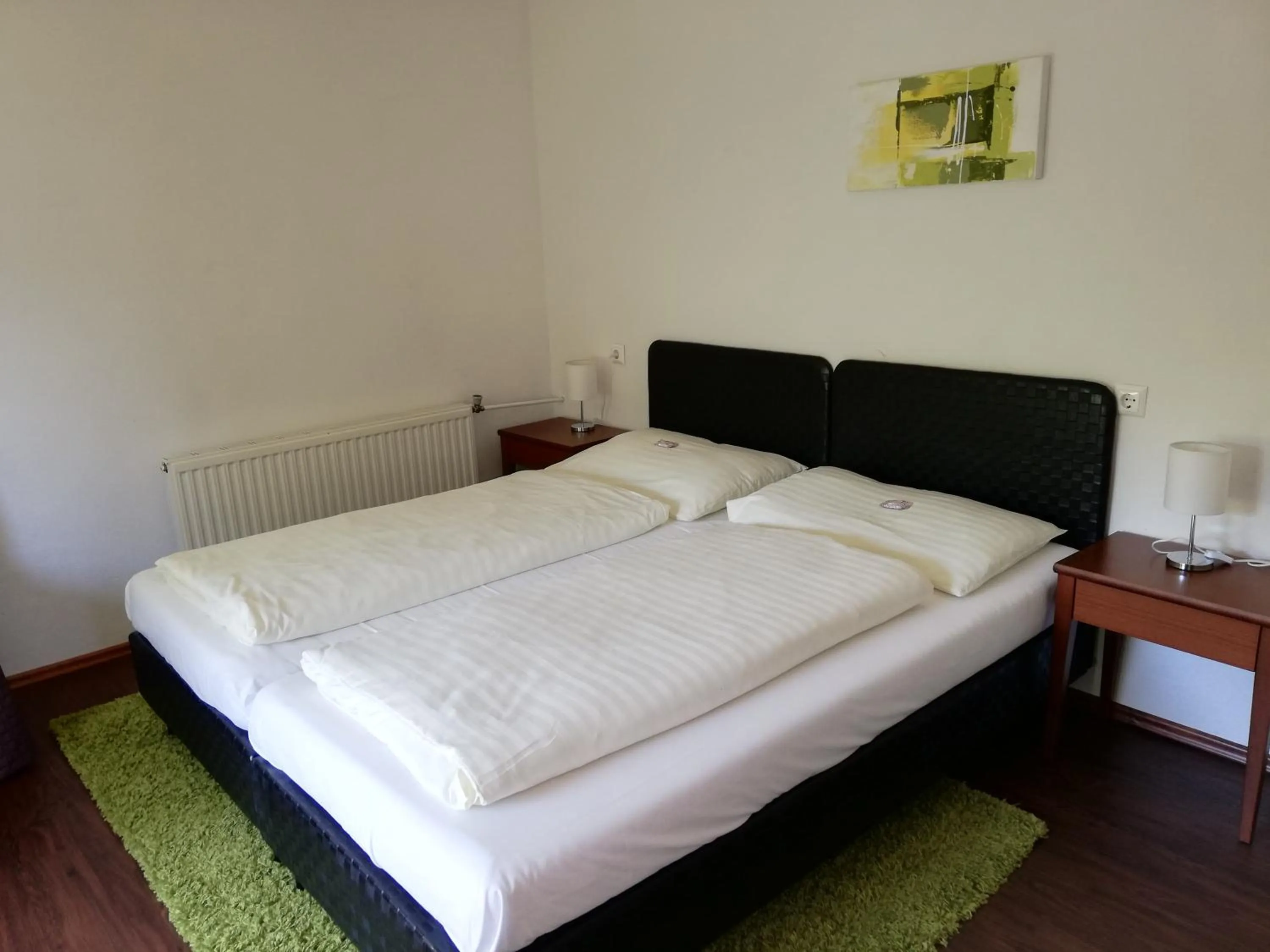 Photo of the whole room, Bed in Hotel Faaker See Inn by S4Y