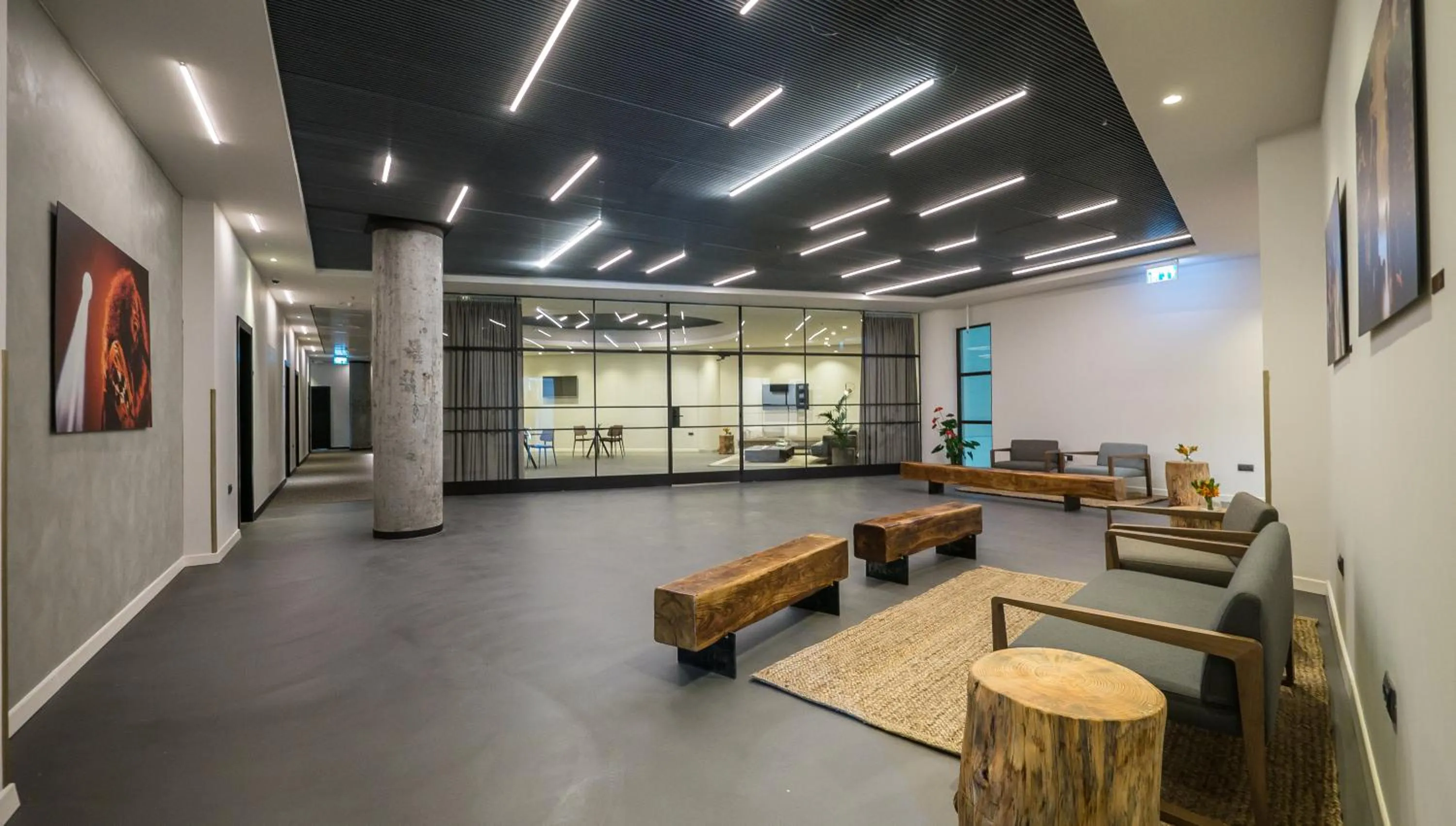 Communal lounge/ TV room in La Cappella Business Boutique Hotel