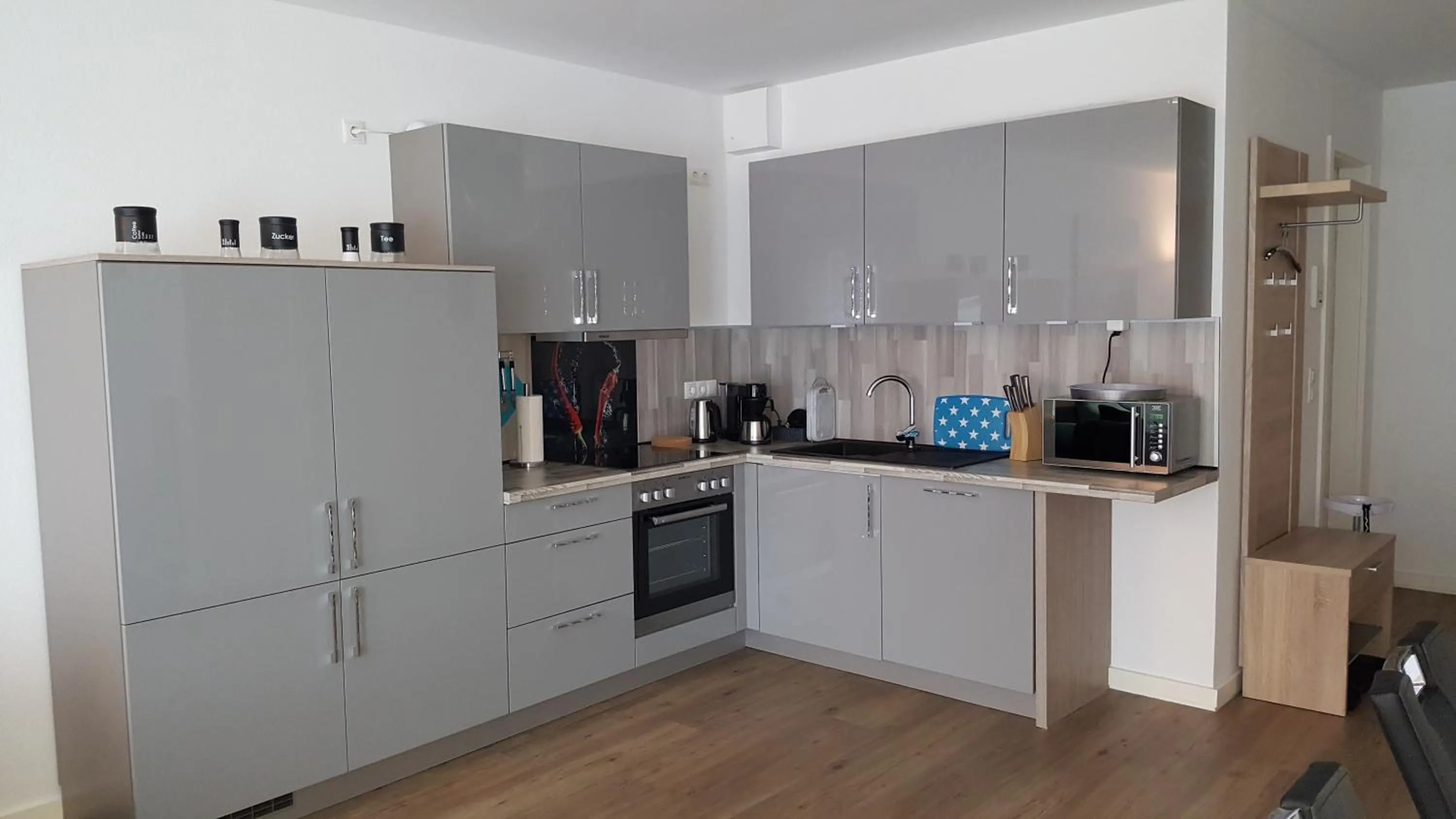 Kitchen or kitchenette in Ferienwohnung Dünenperle