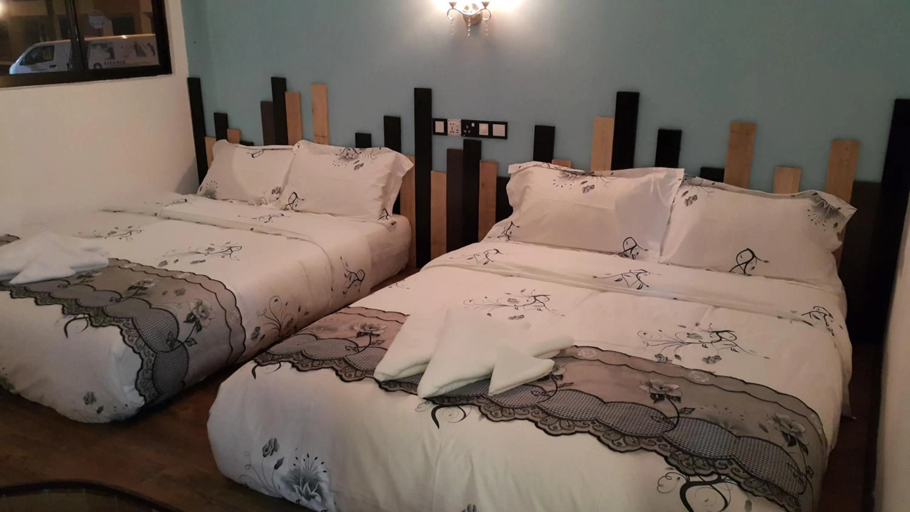 Bedroom in PI Grand Hotel