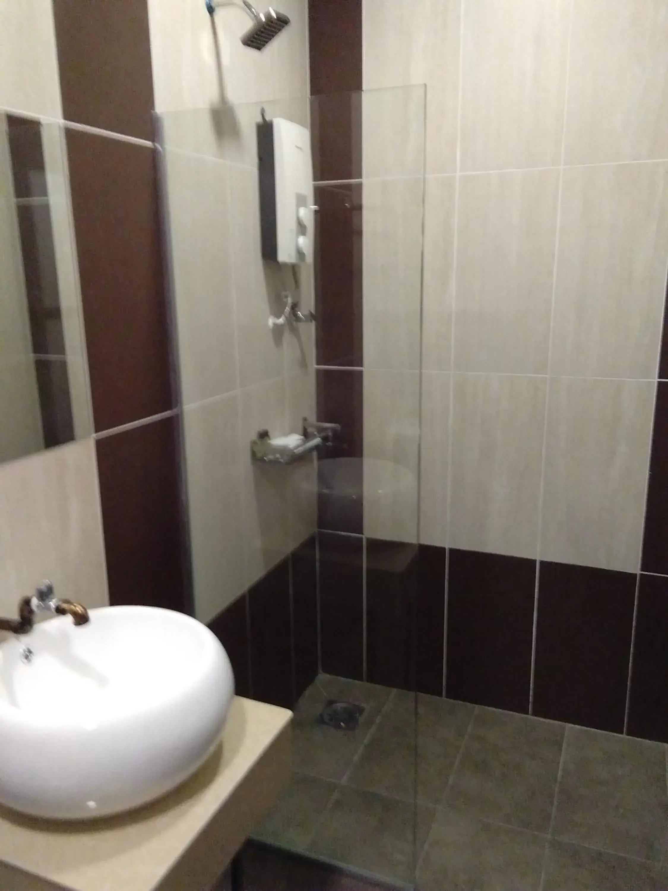 Bathroom in PI Grand Hotel Bathroom in PI Grand Hotel