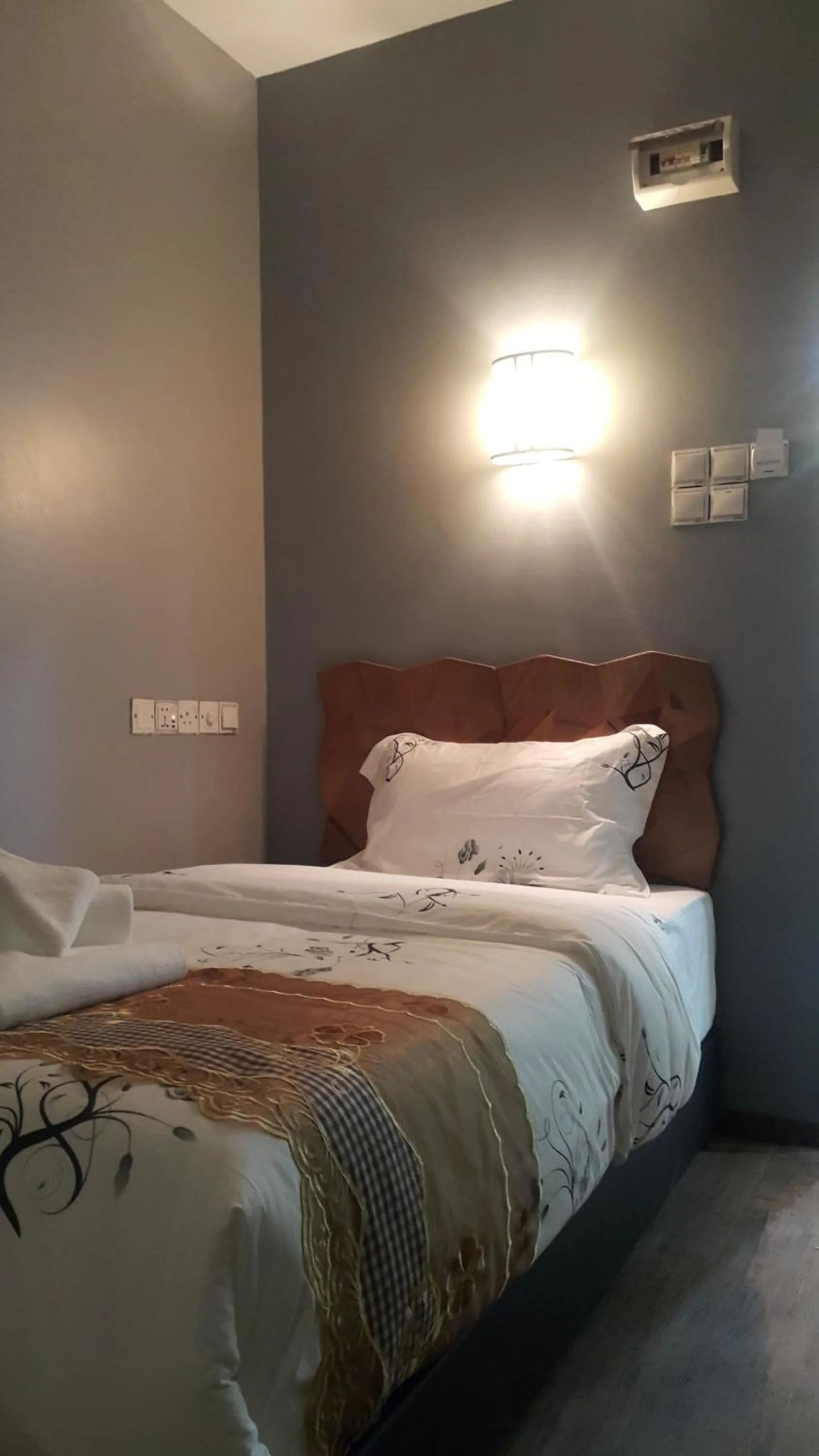 Bedroom in PI Grand Hotel